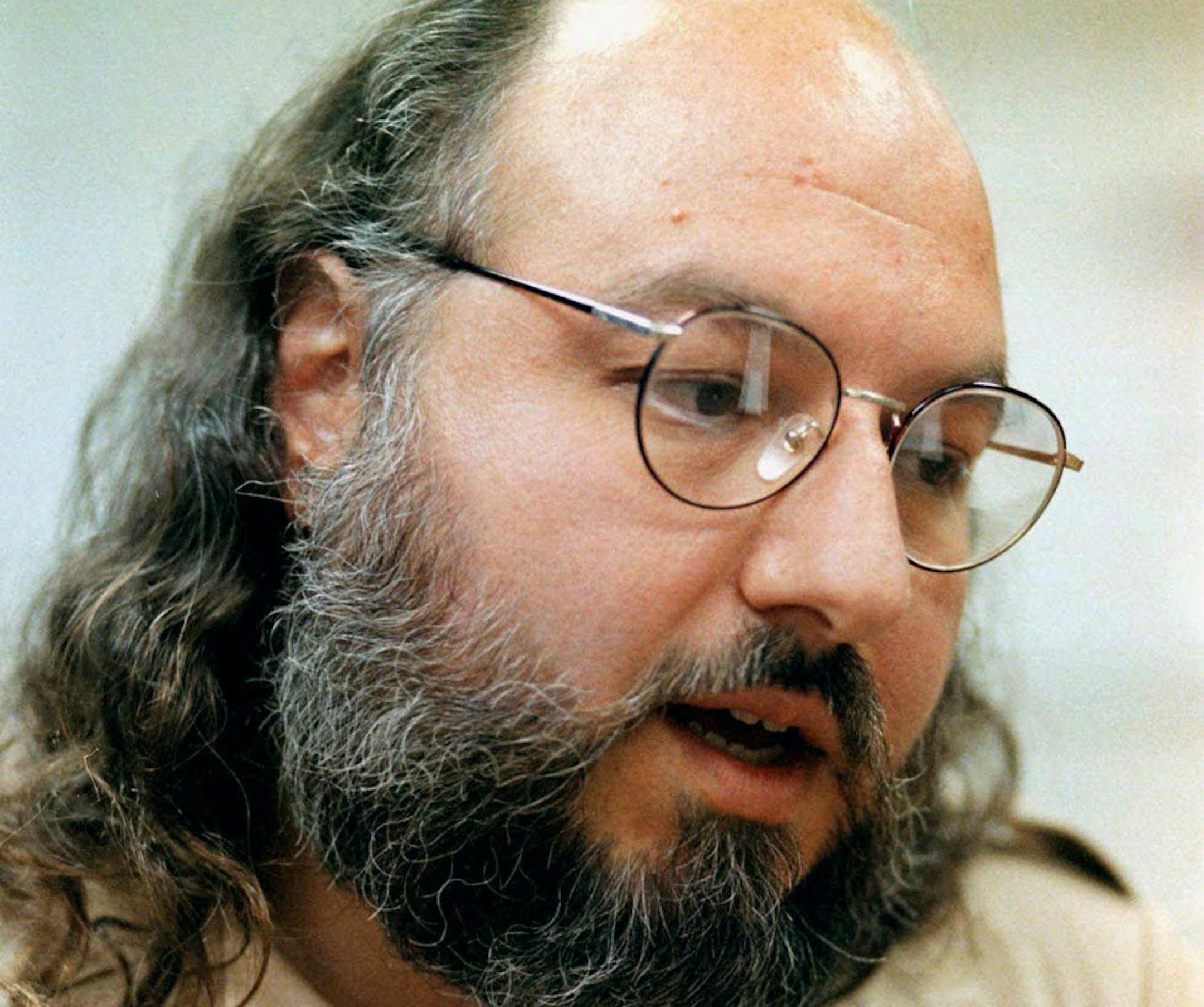 FILE - In this May 15, 1998 file photo, Jonathan Pollard speaks during an interview in a conference room at the Federal Correction Institution in Butner, N.C.