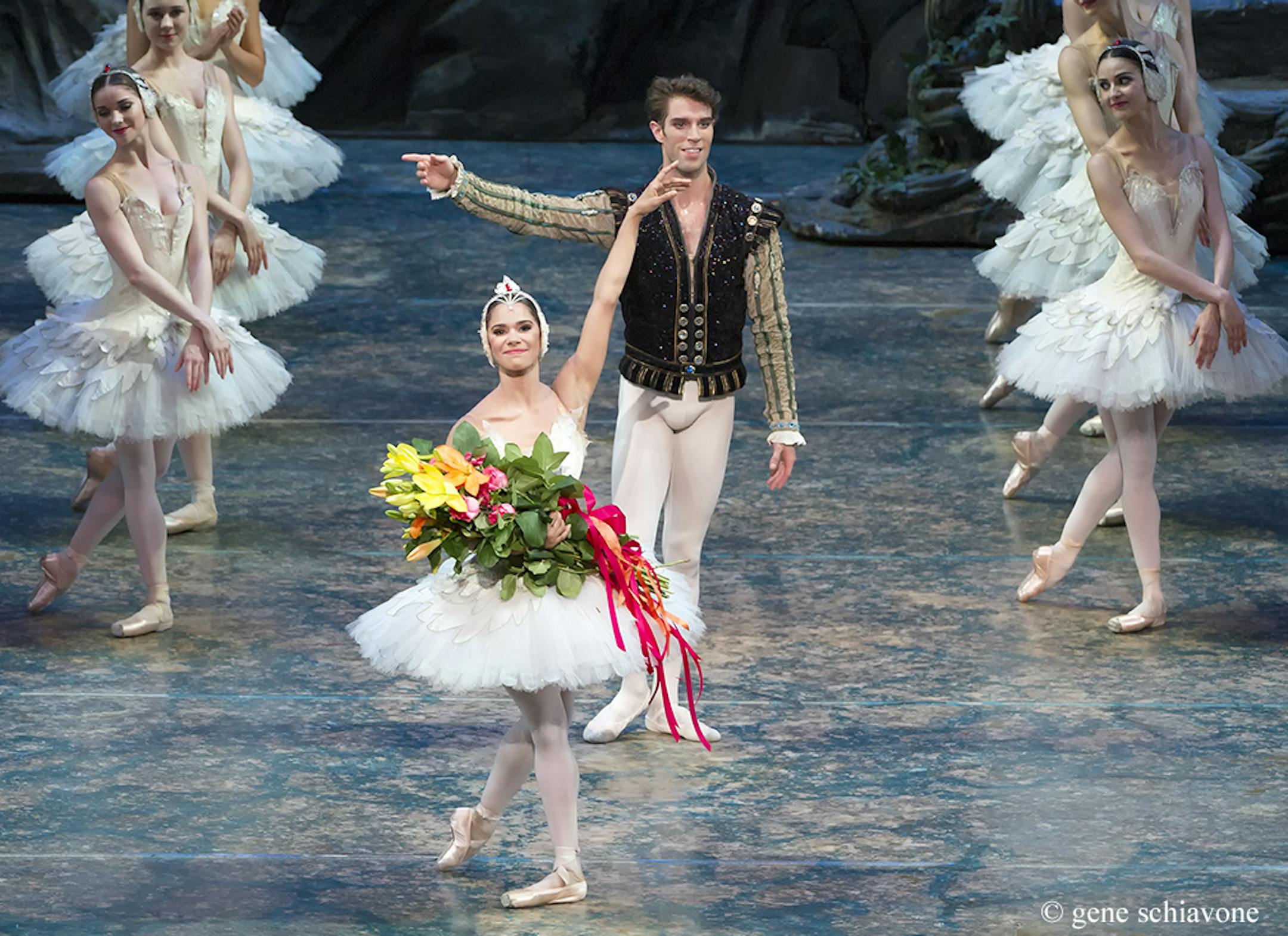 FILE - In this June 24, 2015 photo provided by American Ballet Theater, Misty Copeland and James Whiteside acknowledge the audience after appearing in "Swan Lake" at the Metropolitan Opera House in New York. On Tuesday, June 30, 2015, Copeland was named American Ballet Theater's first black principal dancer. (Gene Schiavone/American Ballet Theater via AP)