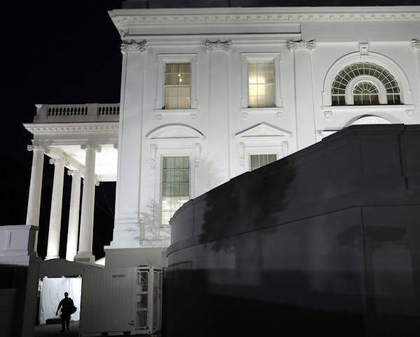 A silhouette of U.S. Secret Service agent is seen on Monday, Nov. 9, 2020 at the White House in Washington, D.C. (Yuri Gripas/Abaca Press/TNS)