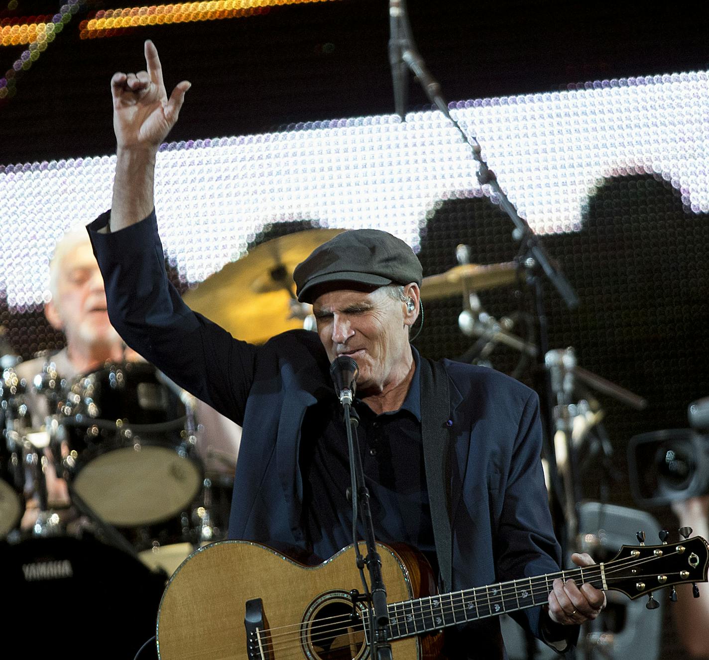 James Taylor headlined the evening and came out to cheering fans on Friday night. He opened with a fan favorite, "Carolina In My Mind". ] ALEX KORMANN &#x2022; alex.kormann@startribune.com James Taylor & HIs All-Star Band performed with special guest Bonnie Raitt & Her Band at the Xcel Energy Center in St. Paul, MN on Friday June 22, 2018. This is Raitt&#x2019;s first night on the tour since her emergency surgery this past spring.