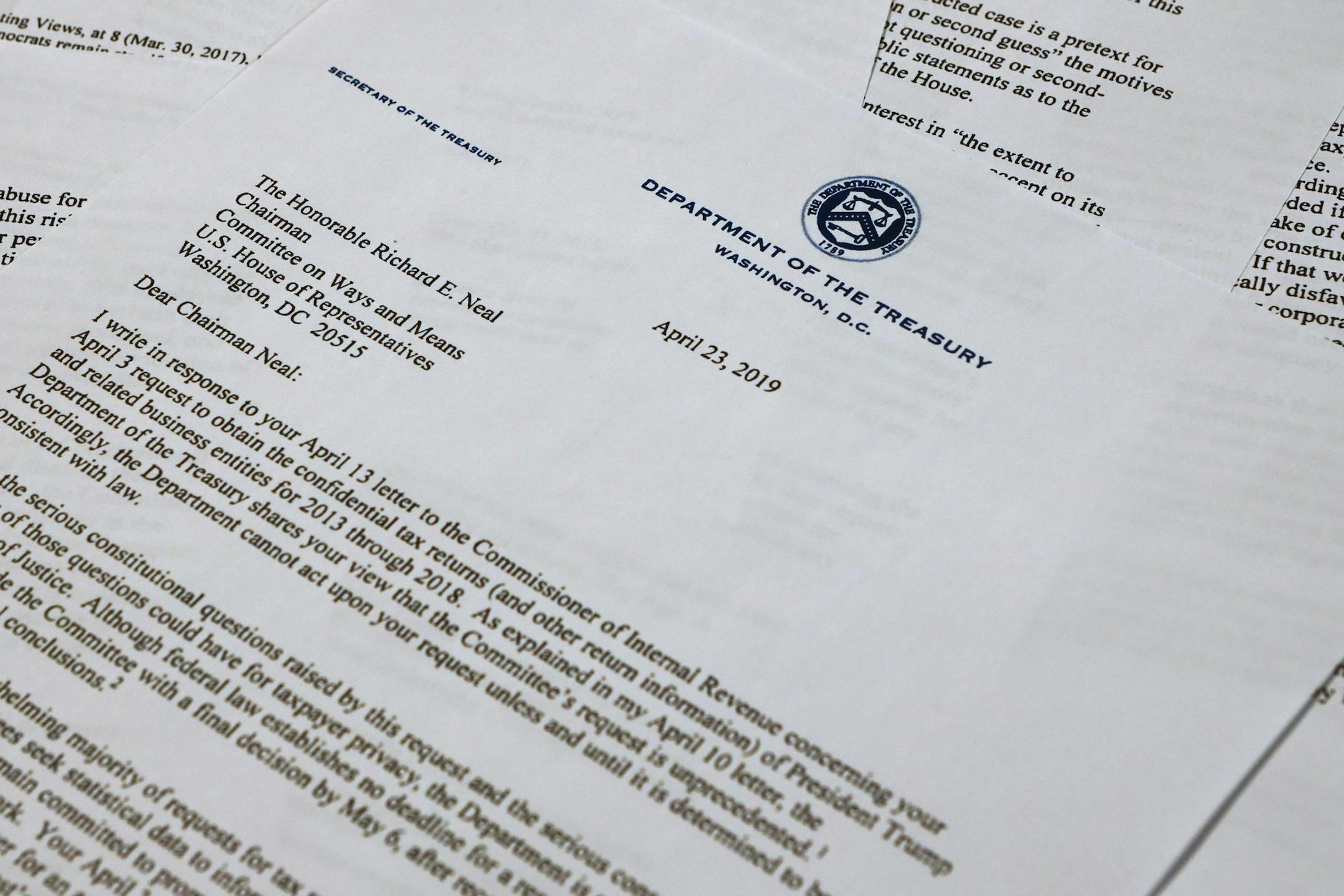 The letter from Treasury Secretary Steven Mnuchin to House Ways and Mean chairman Richard Neal of Mass., is photographed Tuesday, April 23, 2019, in Washington. Mnuchin is asking for more time to respond to House Democrats' request for President Donald Trump's tax returns. (AP Photo/Jon Elswick)