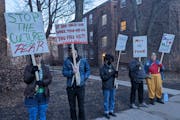 People picketed outside of the Minneapolis Institute of Art on Thursday over a toxic work environment and the firing of curator