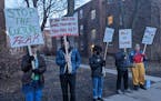 People picketed outside of the Minneapolis Institute of Art on Thursday over a toxic work environment and the firing of curator
