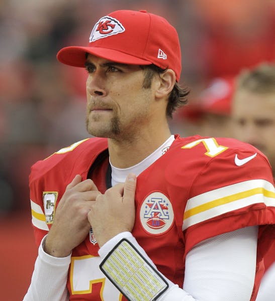 Kansas City Chiefs quarterback Matt Cassel watches from the sidelines after coming out of the game during the second half of an NFL football game agai