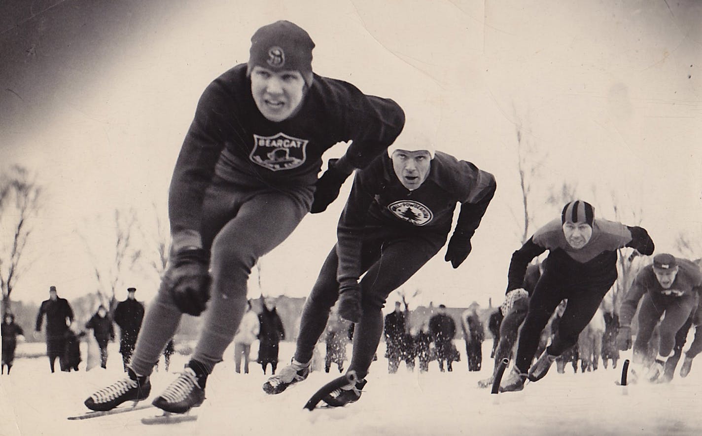 Representing the Bearcats, Gene Sandvig, left, led skating great Kenny Bartholemew in a race.