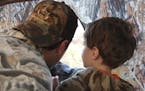 Father and son in turkey blind
credit Jim Williams