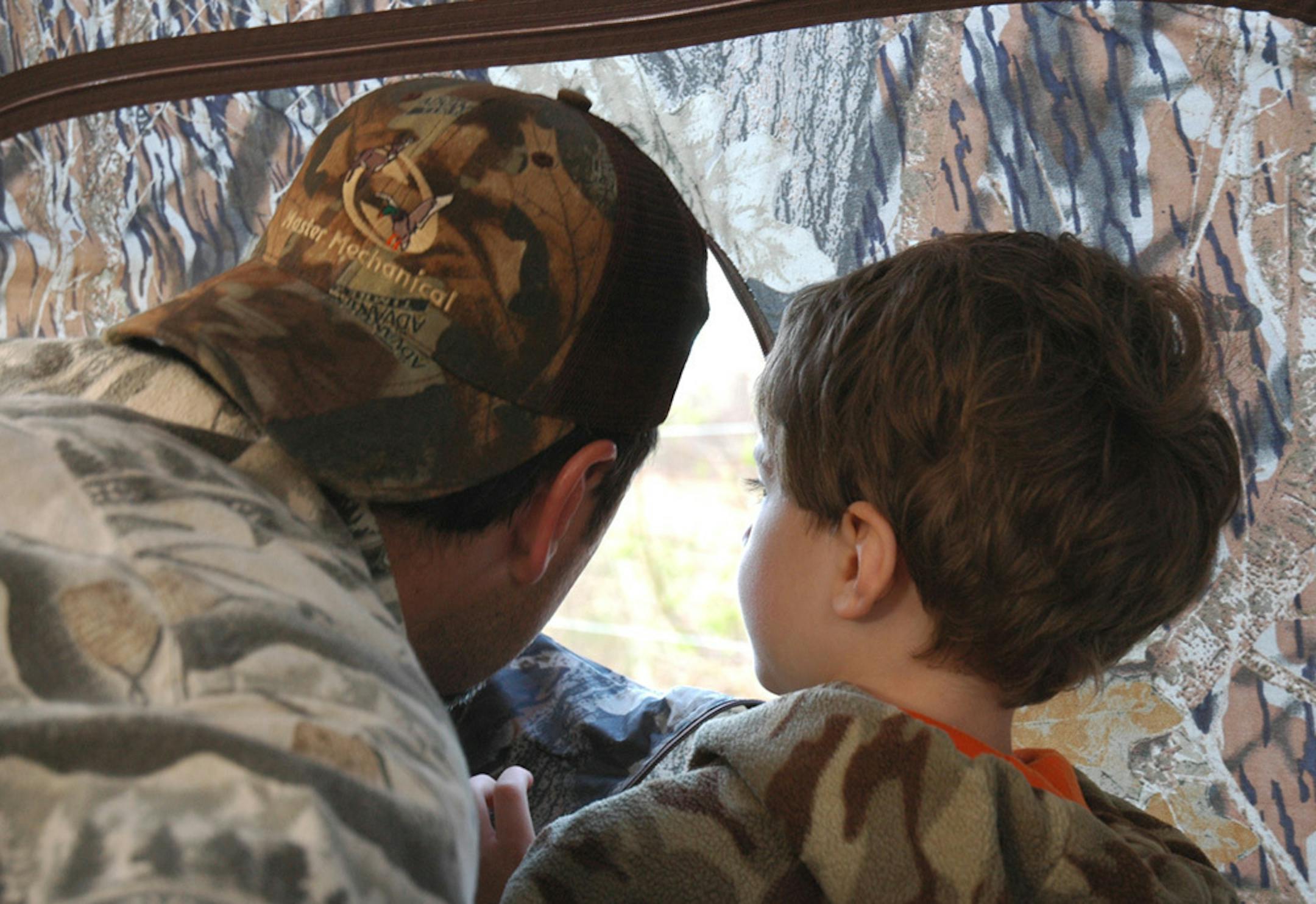 Father and son in turkey blind
credit Jim Williams