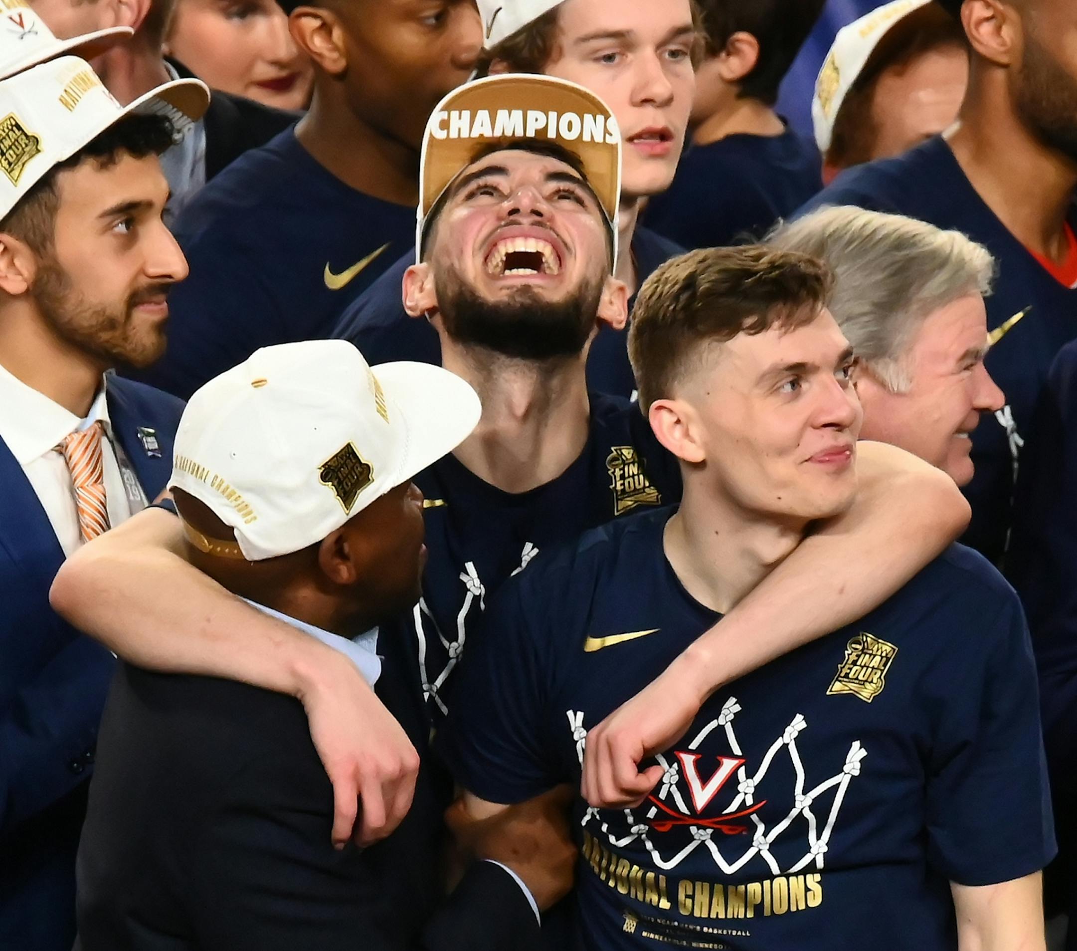 Virginia guard Kyle Guy (5) and Virginia guard Ty Jerome celebrated. Virginia won against Texas Tech 85-87 in overtime.