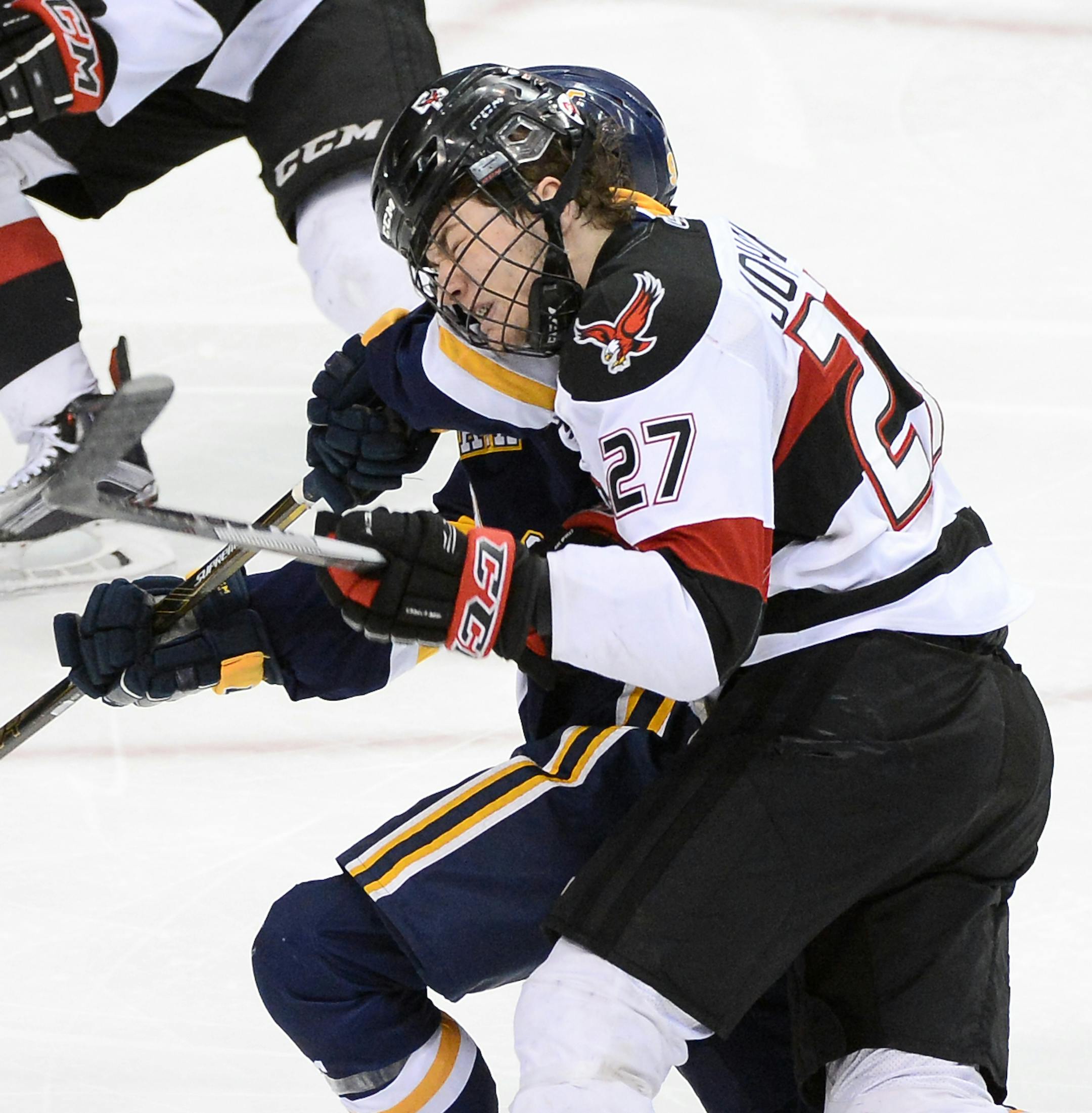 The head of Eden Prairie forward Hunter Johannes (27) met the shoulder of Wayzata forward Dillon Riley (9) during the third period. ] (AARON LAVINSKY/STAR TRIBUNE) aaron.lavinsky@startribune.com Eden Prairie played Wayzata in the Class 2A boys' hockey championship game on Saturday, March 5, 2016 at Xcel Energy Center in St. Paul, Minn.