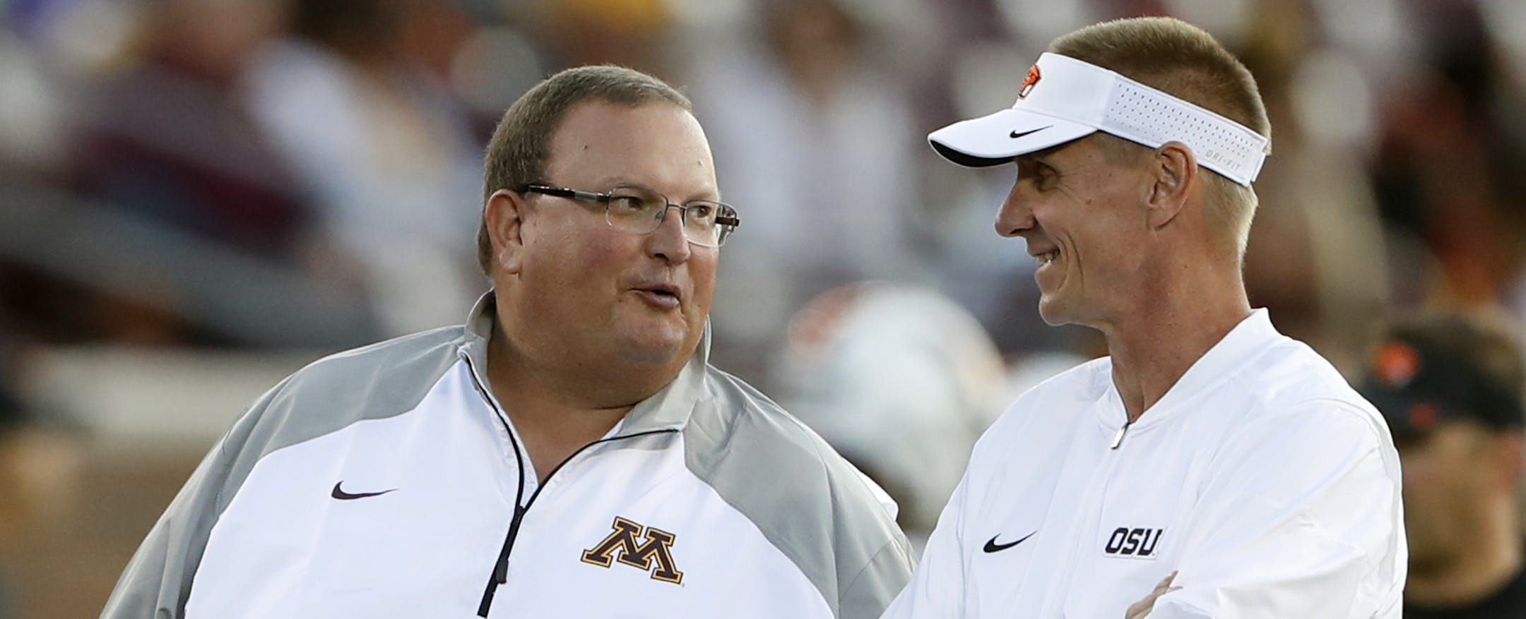 Minnesota head coach Tracy Claeys left talked with Oregon State head coach Gary Andersen before kick off at TCF Bank Stadium Thursday September 1,2016 in Minneapolis, MN.] The Minnesota Golden Gophers hosted Oregon State Beavers Thursday night at TCF Bank Stadium. Jerry Holt / jerry. Holt@Startribune.com