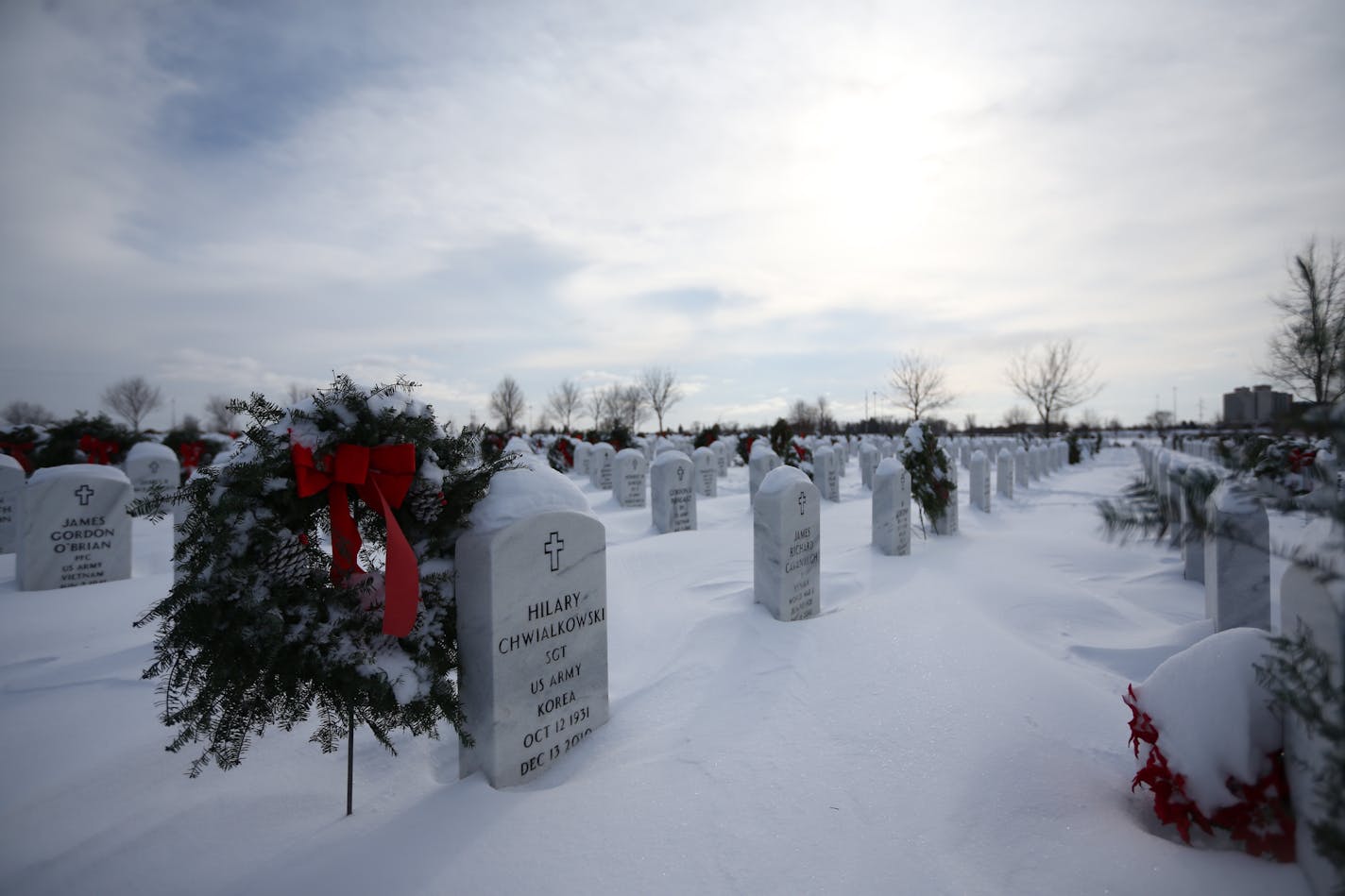 Snow blankets Fort Snelling Cemetery as temperatures begin to slide, part of a deep-freeze that will see windchills well below zero overnight Saturday and into Sunday.