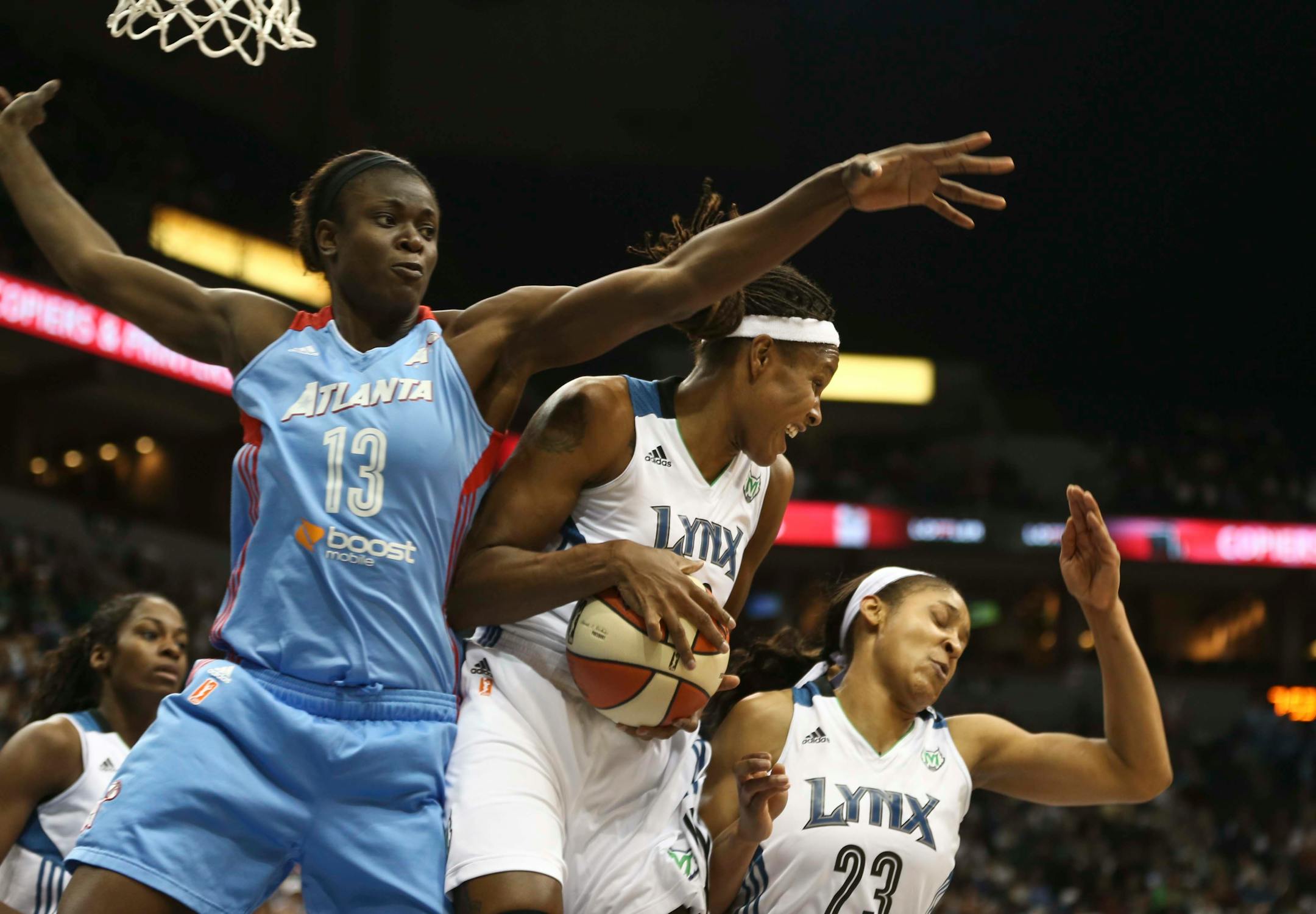 Rebekkah Brunson of the Lynx grabbed the ball away from Aneika Henry of the Atlanta Dream in the first half of Game 1 of the WNBA Finals.