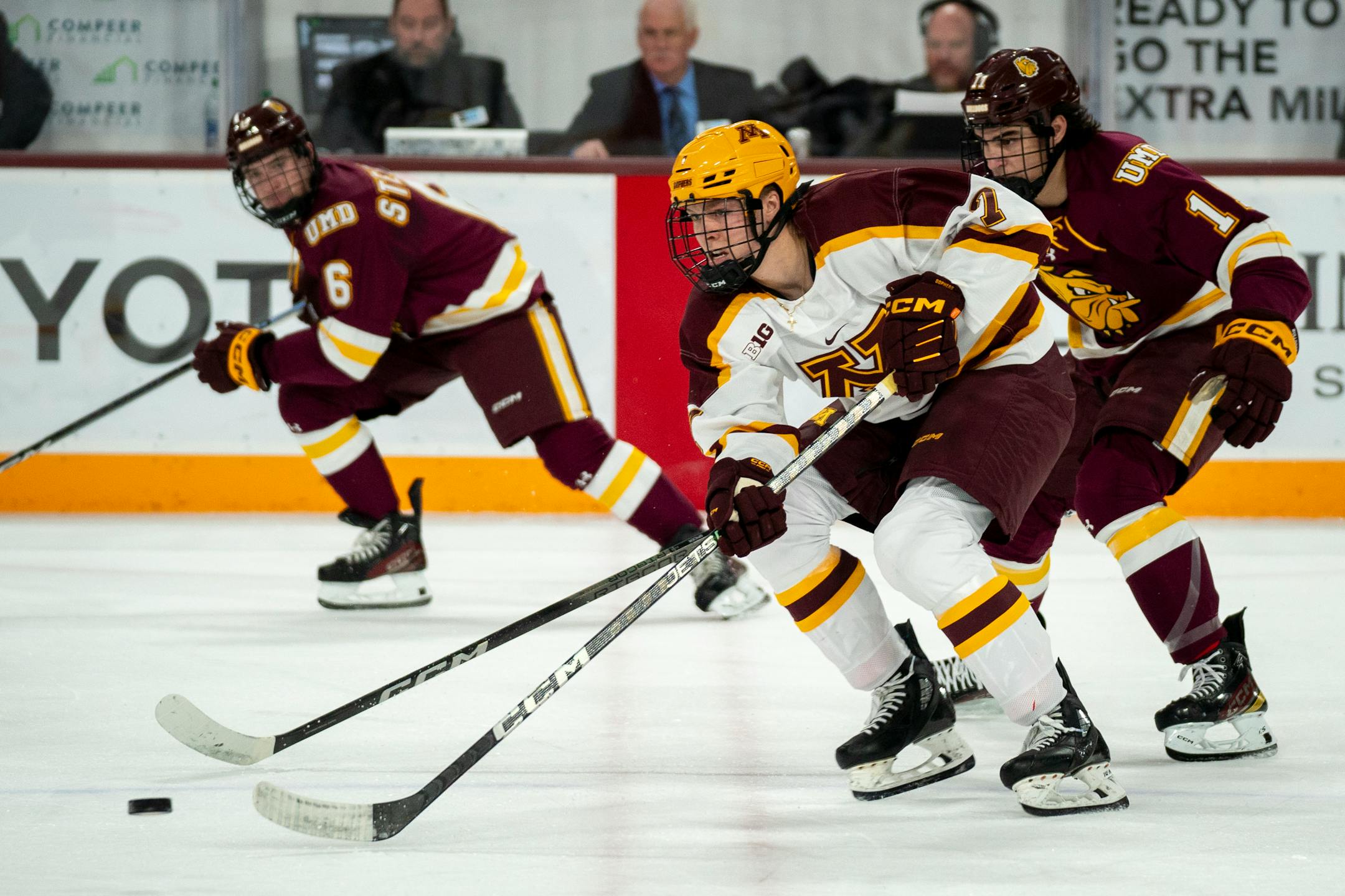 Minnesota forward Aaron Huglen (7) controls the puck at the game against The University of Minnesota Duluth in 3M Arena at Mariucci in Minneapolis on Friday, Nov. 3, 2023.