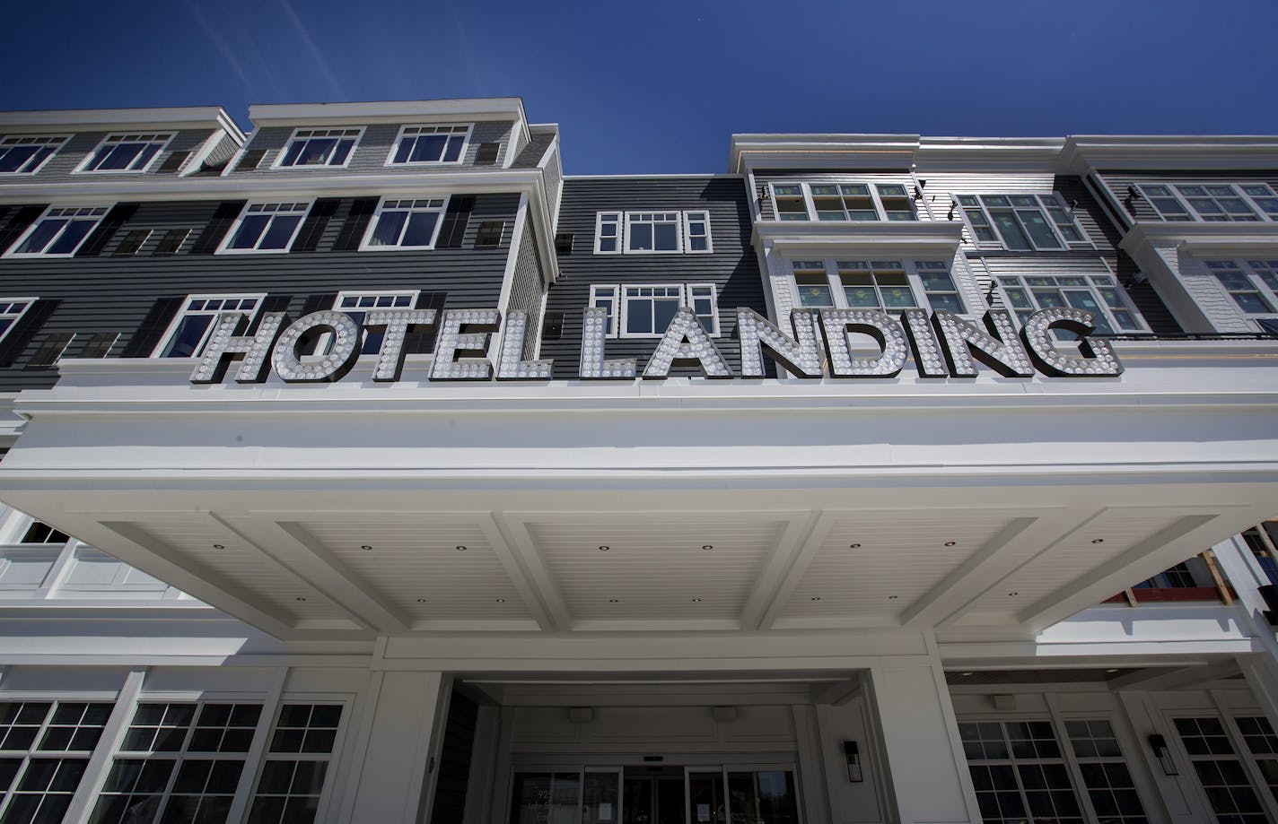 The entrance at the new Hotel Landing in Wayzata. ] CARLOS GONZALEZ &#xef; cgonzalez@startribune.com - June 7, 2017, Wayzata, MN, Hotel Landing Wayzata's new hotel opens Thursday, the first hotel on Lake Minnetonka in more than 50 years. It represents a sort of mini comeback of the era of grand hotels that once dotted the Lake Minnetonka shoreline. For more than 15 years, developers in Wayzata and Excelsior have tried to bring hotels back to the area but this is the first one to materialize.