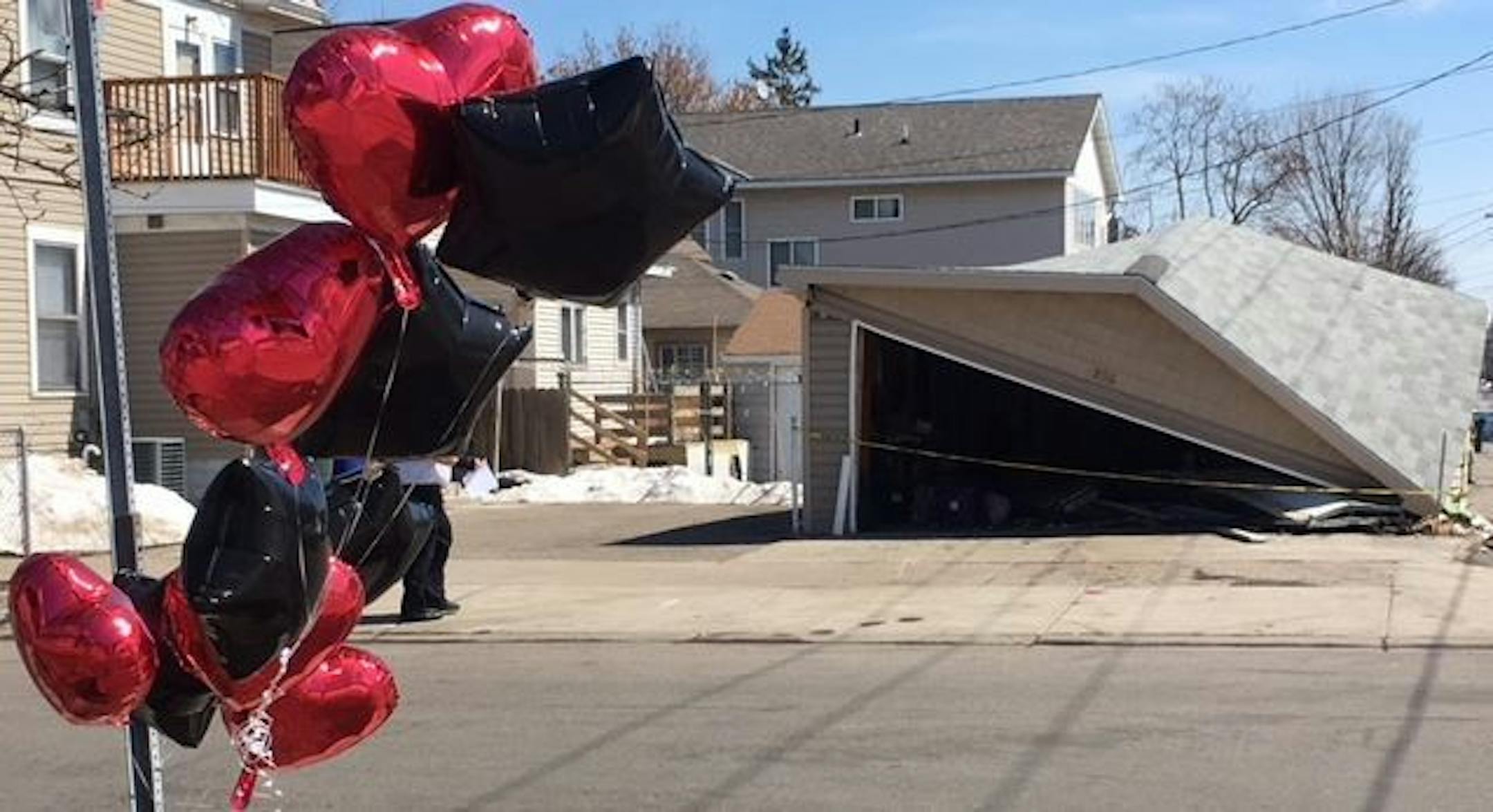 The scene of a violent crash late Friday, April 20, 2018, in St. Paul that killed a 41-year-old driver passing by and injured a suspect fleeing police. The crash also destroyed a garage in the 800 block of Sherburne Avenue.