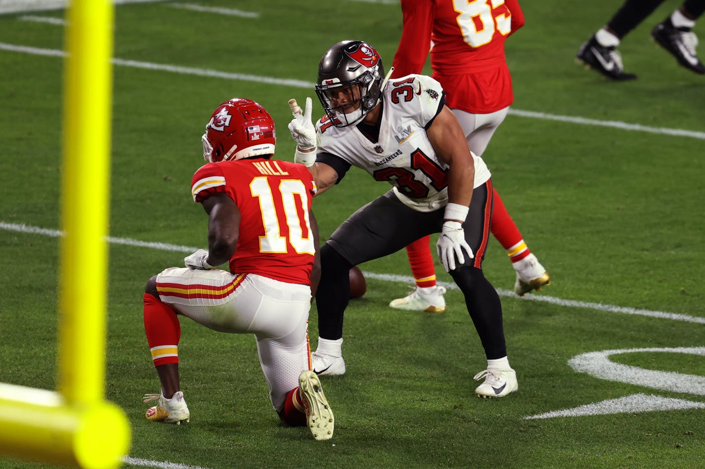 Tampa Bay Buccaneers strong safety Antoine Winfield Jr. taunts Kansas City Chiefs wide receiver Tyreek Hill after a play during the second half of the NFL Super Bowl 55 football game Sunday, Feb. 7, 2021, in Tampa, Fla. (AP Photo/Mark LoMoglio)