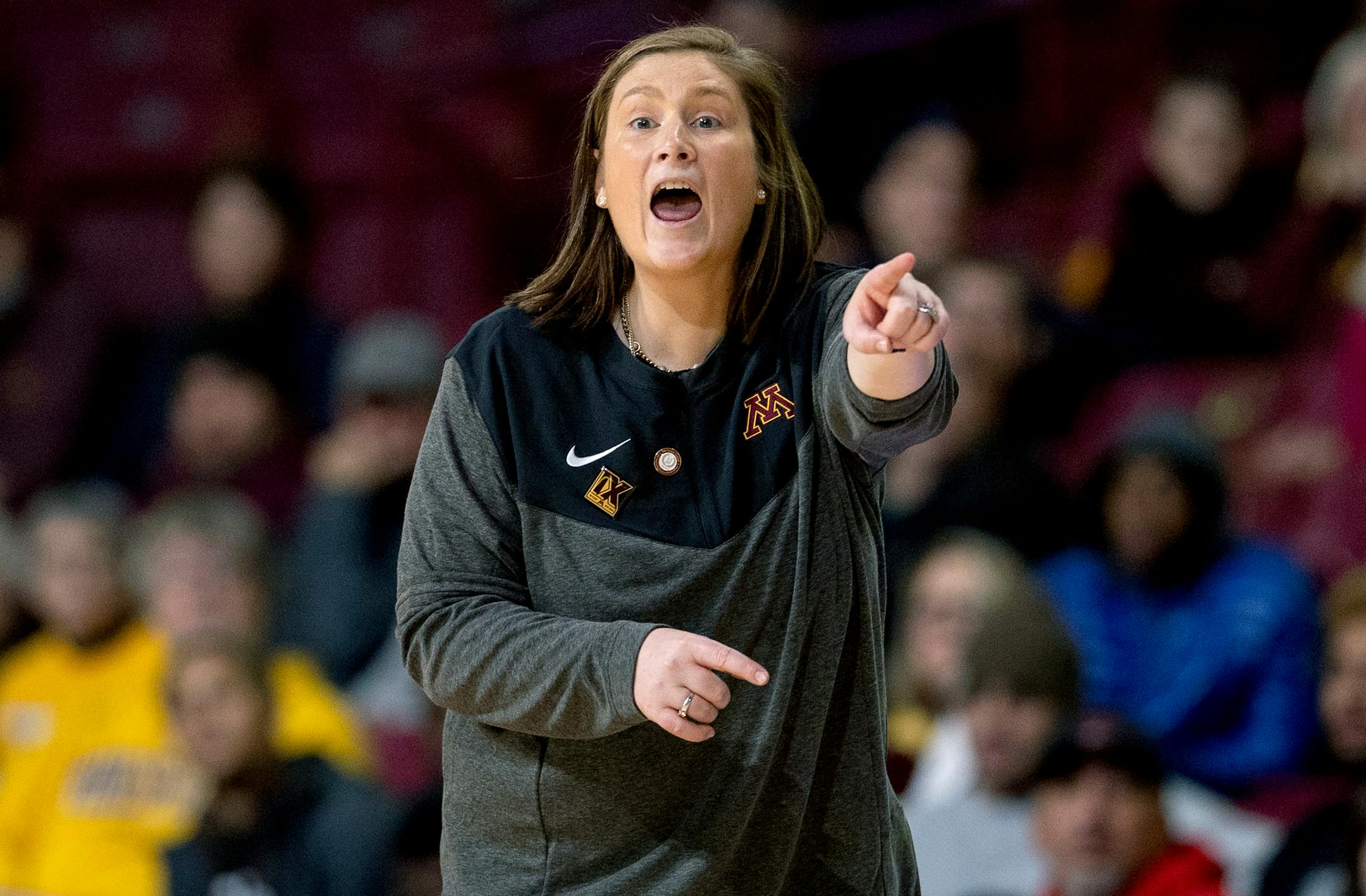 Minnesota head coach Lindsay Whalen shouts from the sideline during the second quarter of an NCAA college basketball game against Western Illinois Monday, Nov. 7, 2022, in Minneapolis, Minn. (Carlos Gonzalez/Star Tribune via AP)