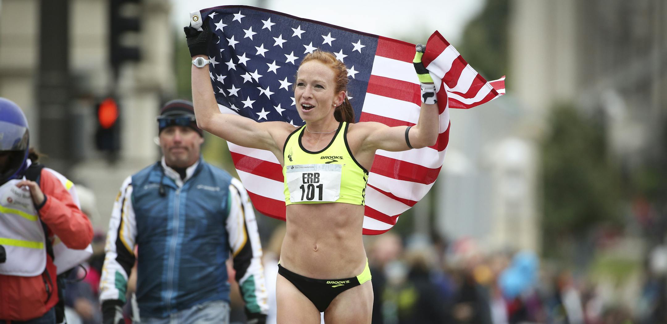 Women's marathon winner Esther Erb did her victory lap at the 2014 Medtronic Twin Cities Marathon on Sunday, October 5, 2014 in St. Paul, Minn. ] RENEE JONES SCHNEIDER • reneejones@startribune.com