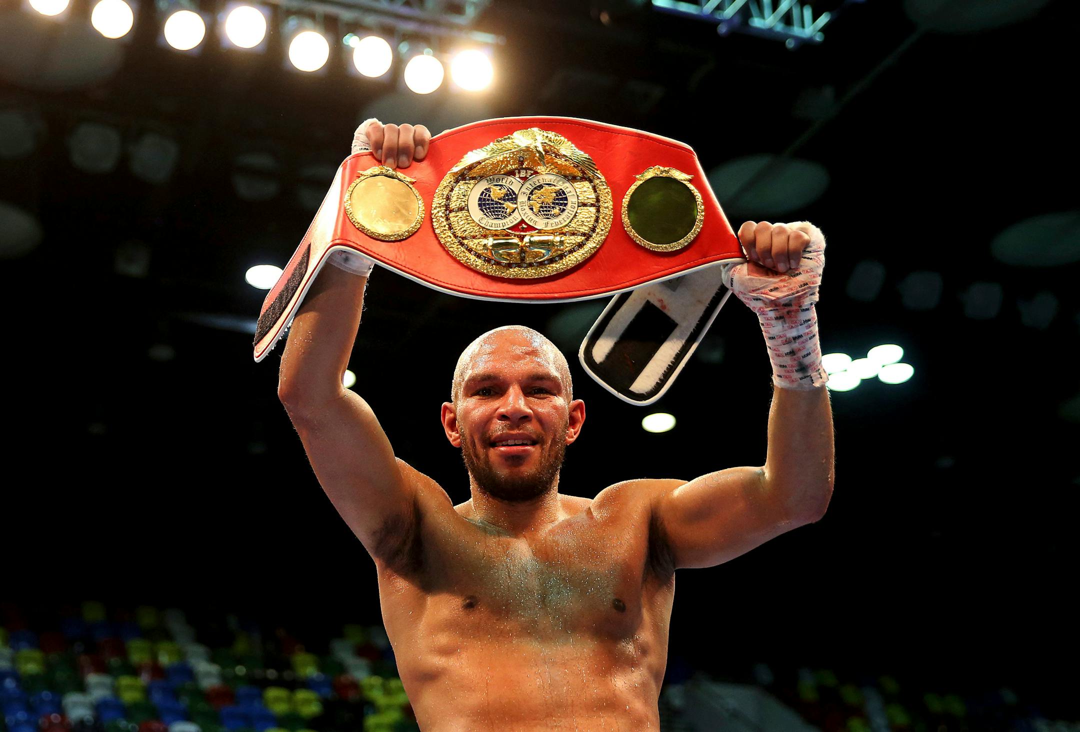 Caleb Truax of the U.S. celebrates after beating James Degale of Britain in their IBF World super middleweight championship bout at the Copper Box Arena in London, Saturday Dec. 9, 2017. (Steven Paston/PA via AP)