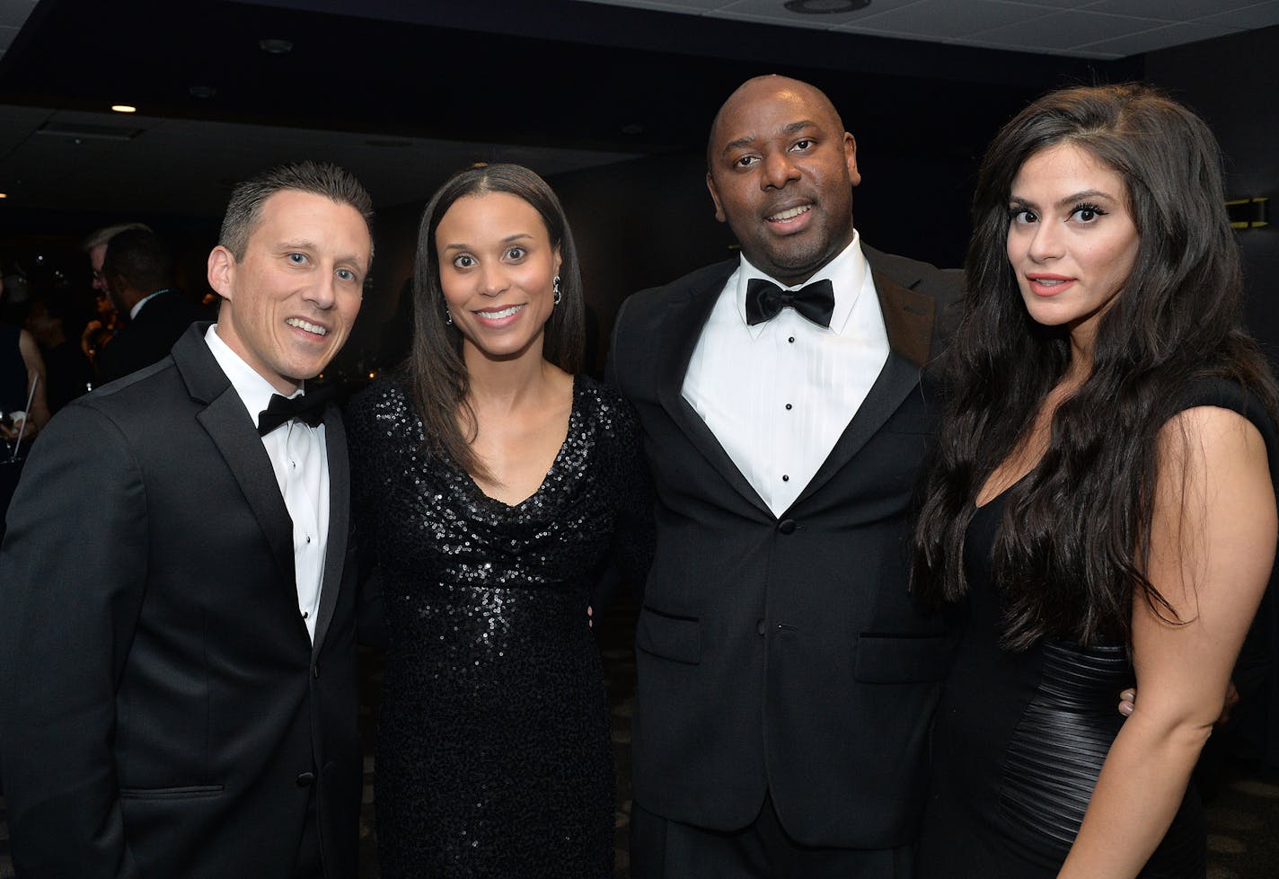 From left, Mike and Kia Olson, Seun Aiyese and Lara Ahmed. ] (SPECIAL TO THE STAR TRIBUNE/BRE McGEE) **Mike Olson (left), Kia Olson (second form left), Seun Aiyese (second from right), Lara Ahmed (right), UNCF Masked Ball