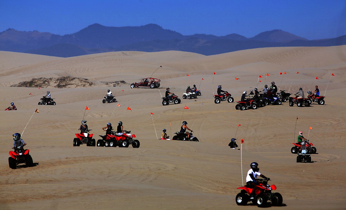 Hundreds of ATV enthusiasts of all ages, crowded the Oceano Dunes State Vehicular Recreation Area during Labor Day weekend. Many of the riders camp along the beach for the weekend as well, in order to stay close to the dunes riding area. ] JIM GEHRZ &#x201a;&#xc4;&#xa2; jgehrz@startribune.com / San Luis Obispo, CA 8/31, 2014 /1:00 PM / BACKGROUND INFORMATION: Trip to San Luis Obispo, CA, to cover ATV scene at Oceano Dunes State Vehicular Recreation Area along the Pacific Ocean. Also interviewed