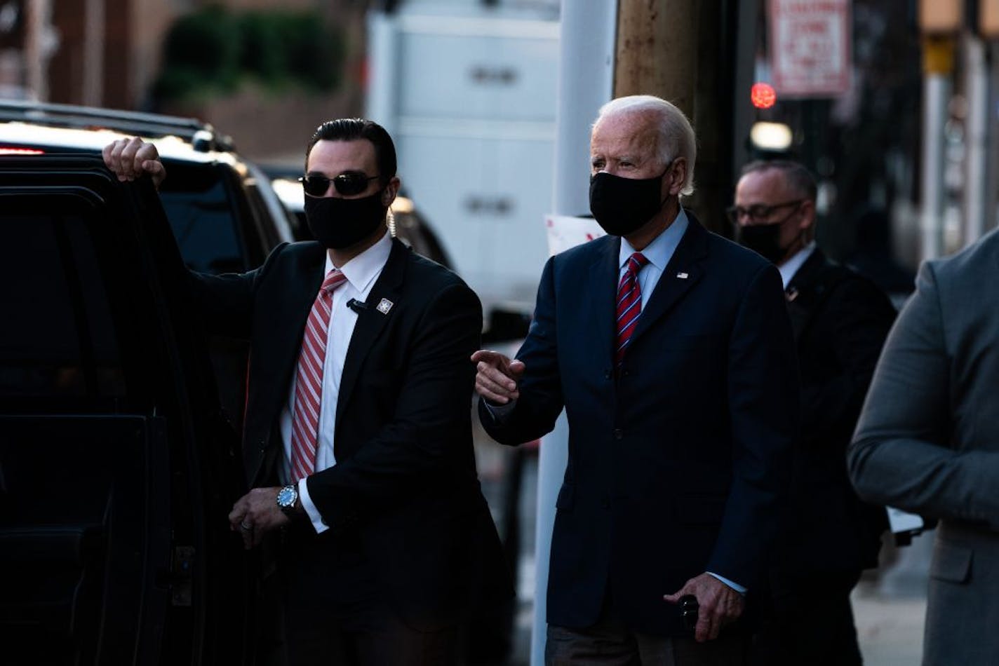 President-elect Joe Biden outside The Queen theater in Wilmington, Del., on Nov. 23, 2020. President Trump's government on Nov. 23, 2020 authorized President-elect Joe Biden to begin a formal transition process after Michigan certified Biden as its winner, a strong sign that the president's last-ditch bid to overturn the results was coming to an end.