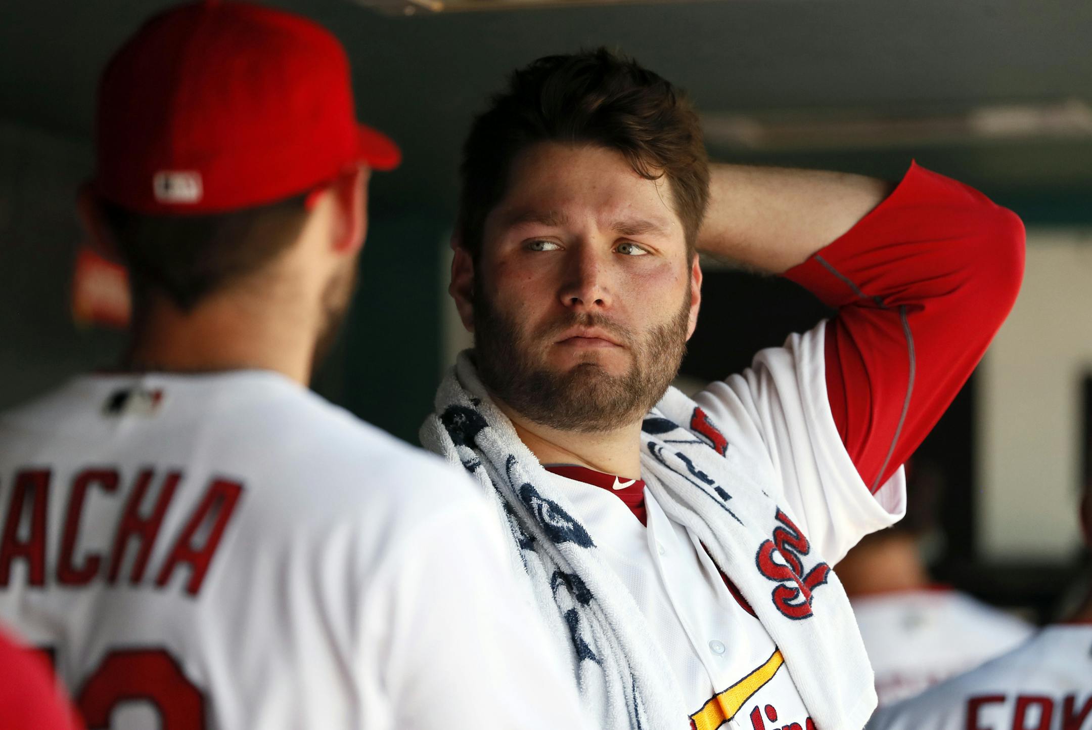 St. Louis Cardinals starting pitcher Lance Lynn, right, talks with fellow pitcher Michael Wacha after being removed during the sixth inning in the first game of a baseball doubleheader against the Milwaukee Brewers Tuesday, June 13, 2017, in St. Louis. (AP Photo/Jeff Roberson) ORG XMIT: MOJR