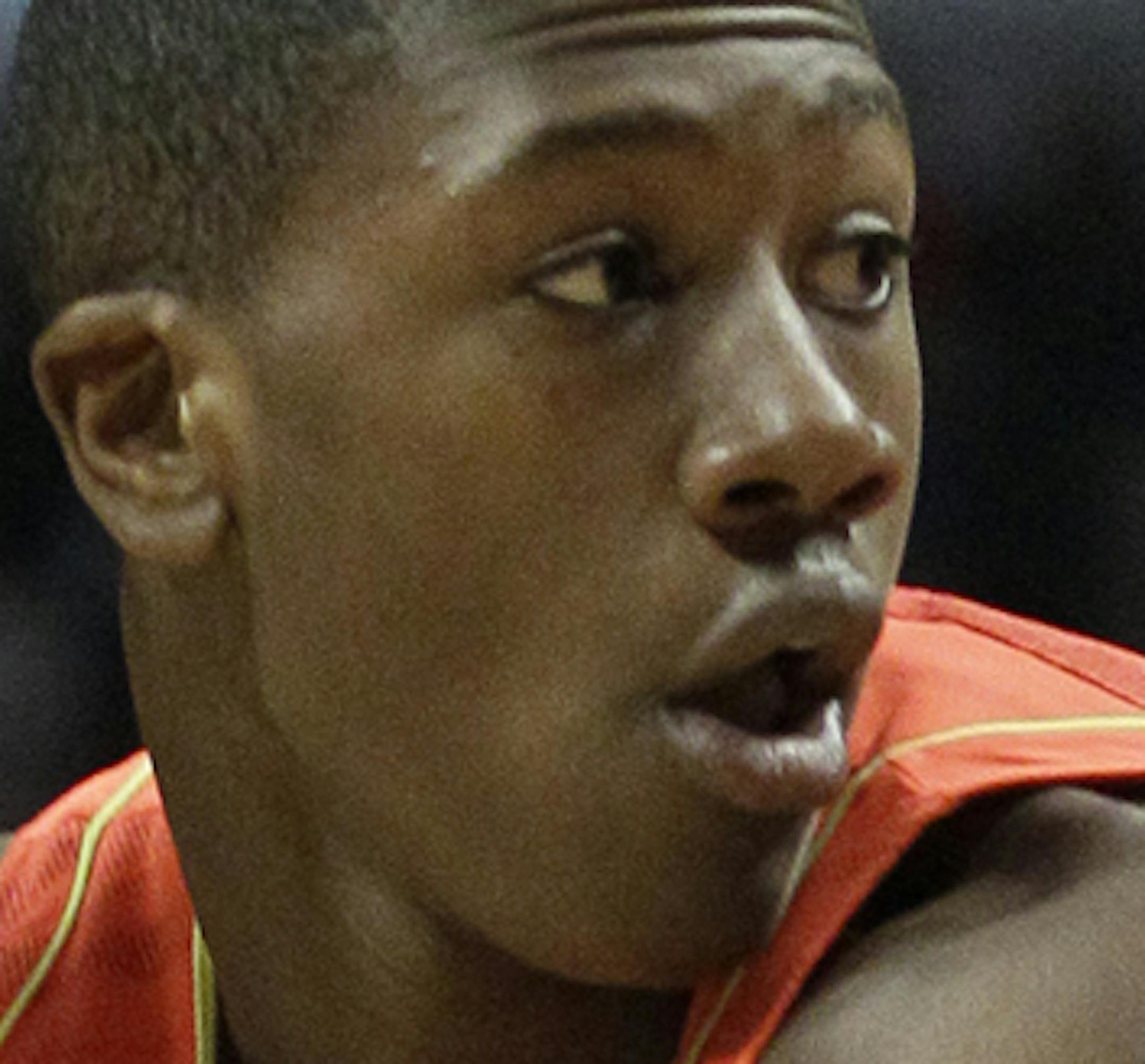 McDonald's East All-American Kris Dunn (3) looks to pass the ball as Wests' Kevin Ferrell (1) pushes back in defense during the first half of the McDonald's All-American boys' basketball game Wednesday, March 28, 2012, in Chicago. (AP Photo/Nam Y. Huh) ORG XMIT: CXA
