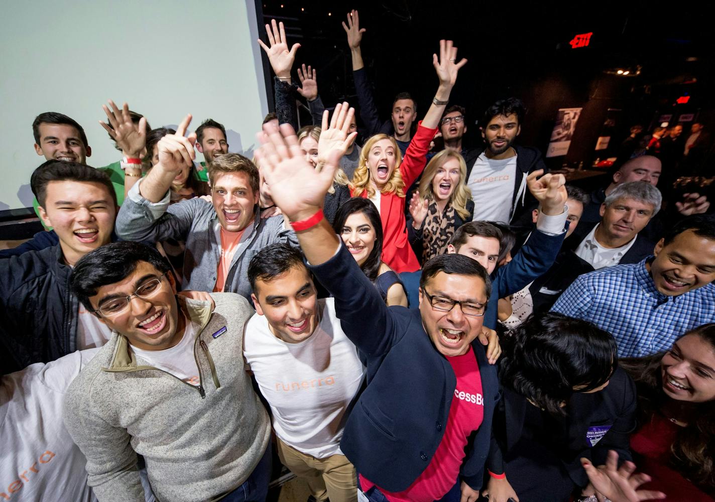 The Target+Techstars Retail Accelerator participants celebrate after giving their pitches Wednesday to an audience of over 200 at their DemoDay, part of Twin Cities Startup Week. Bottom left is Bharat Pulgam, CEO of Runerra. Behind him are Josh Change, chief marketing officer, and Sam Lerdahl, chief technical officer. In the back right is Niel Patel, chief operating officer. ORG XMIT: MIN1810121219441116