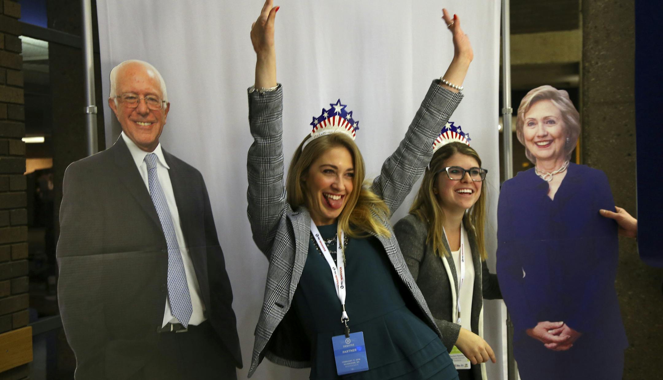 Katherine Fitzgerald, left, and Rachel Palermo pose with cutouts of Bernie Sanders and Hillary Clinton at the site of a debate between Hillary Clinton and Sen. Bernie Sanders, on the campus of the University of Wisconsin - Milwaukee, Feb. 11, 2016. The two Democratic presidential hopefuls were debating just two days after Sanders&#xed; big victory in the New Hampshire primary. (Jim Wilson/The New York Times)