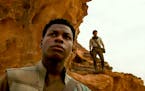 Finn (John Boyega) and Poe Dameron (Oscar Isaac) in STAR WARS: THE RISE OF SKYWALKER. ORG XMIT: DL-72964