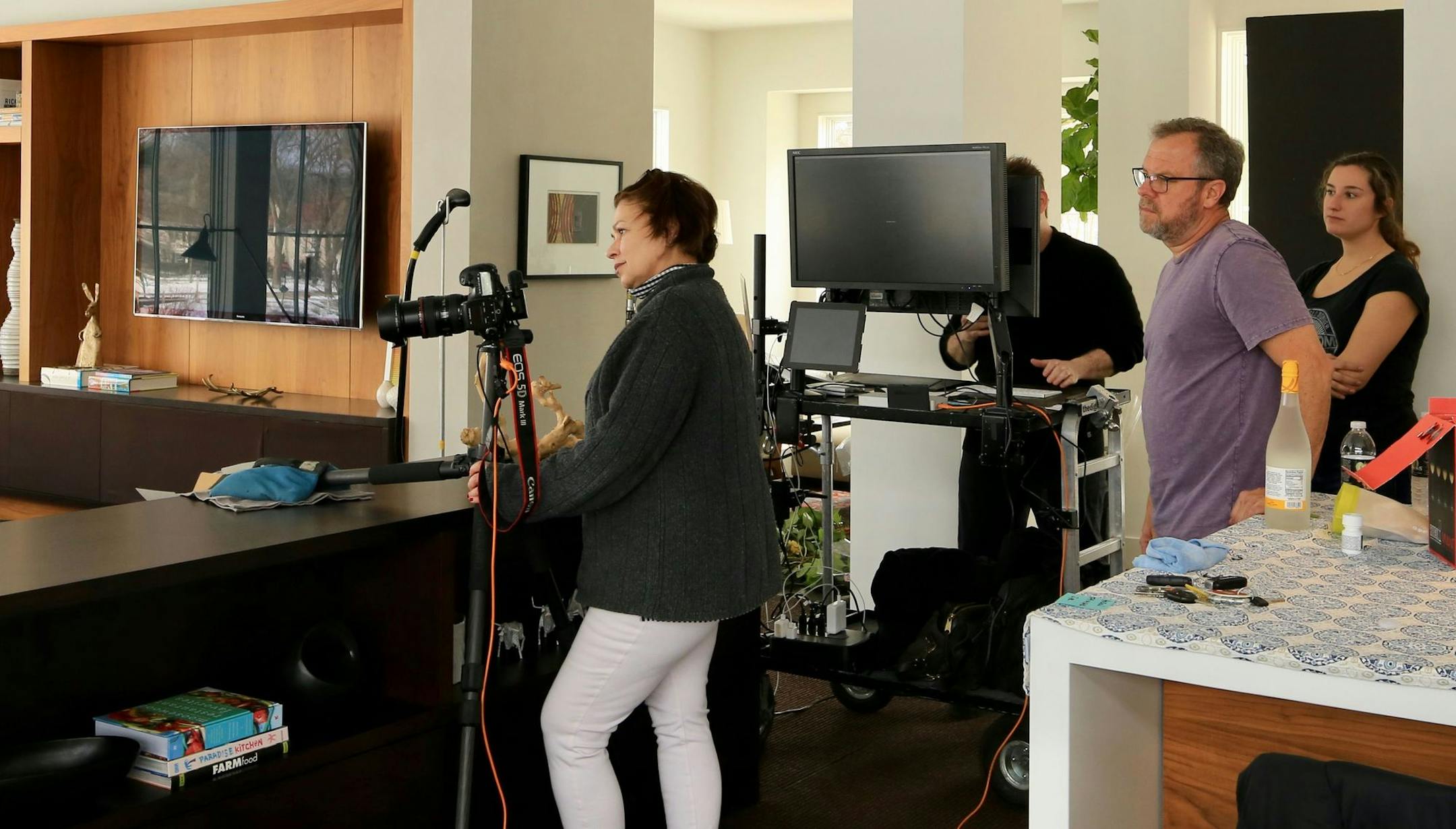 A crew at a photo in a model home in Edina