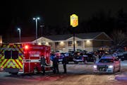 Police and emergency service personnel secure the scene of an active shooter the evening of Monday Dec. 8, 2023 at Big Lake Road and Minnesota Highway