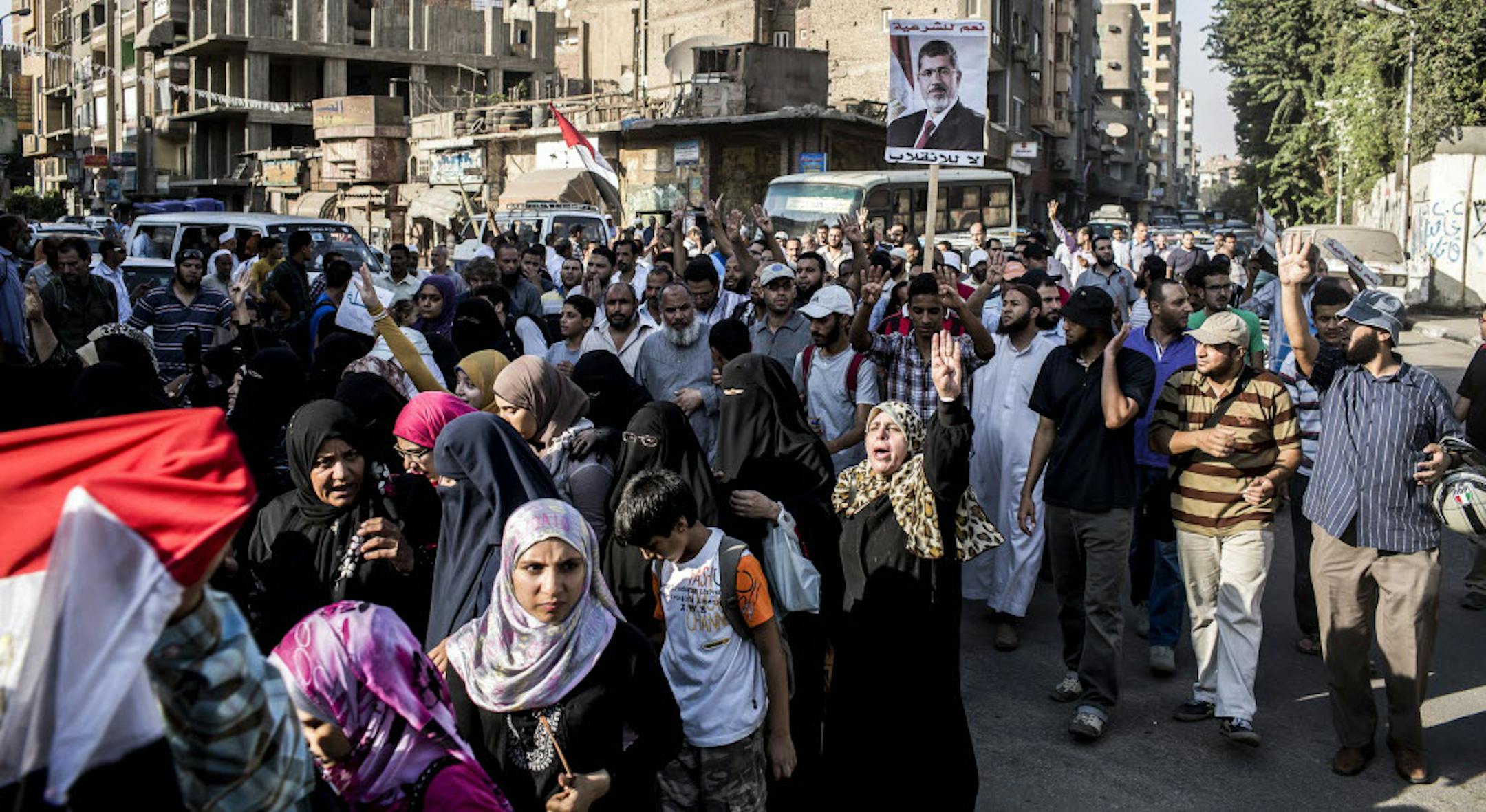 Supporters of the ousted Egyptian president, Mohammed Morsi, march in the Maadi neighborhood of Cairo.