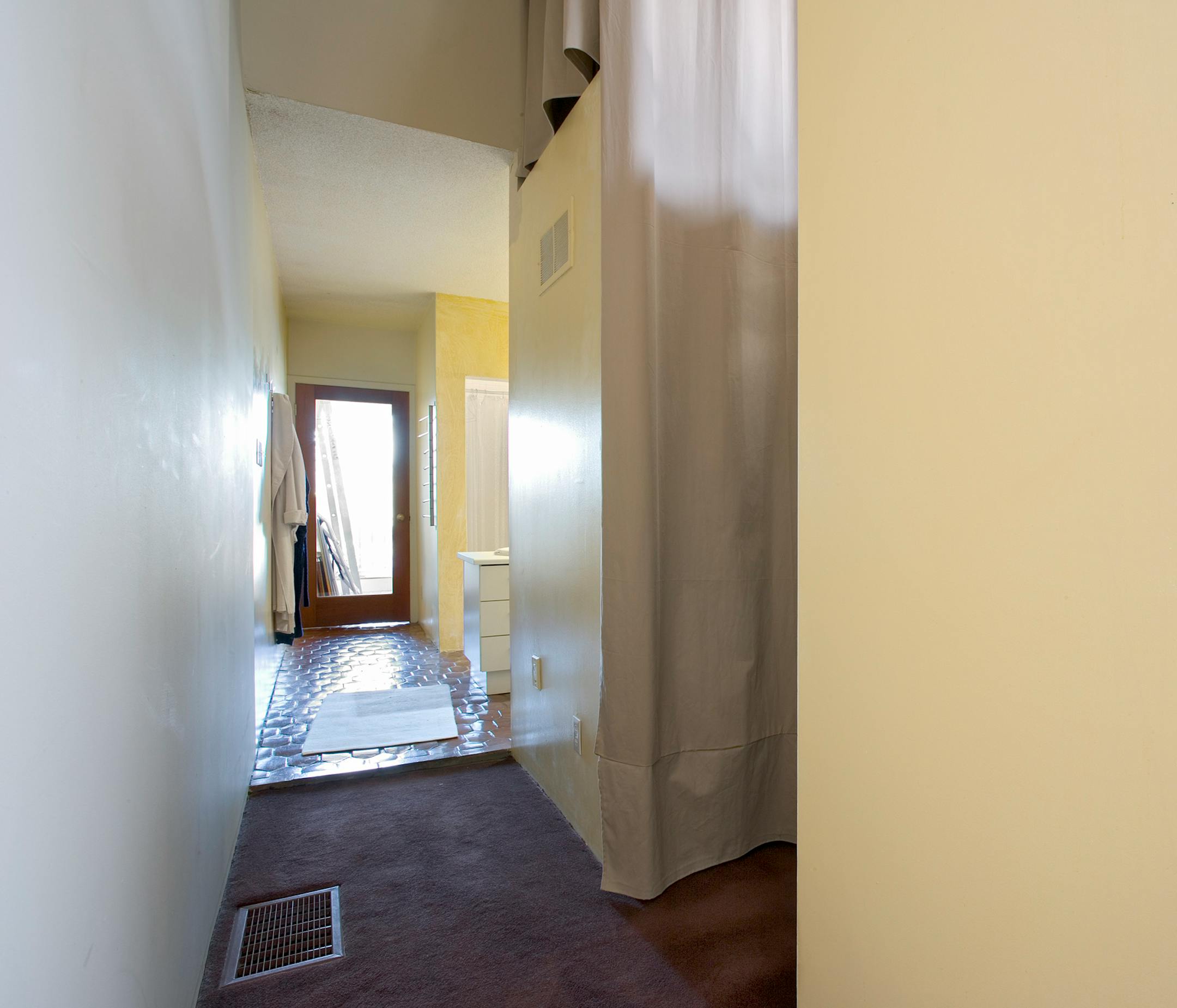 Nick and Henry's master bathroom needed a makeover so it could function as a bath and a gym.