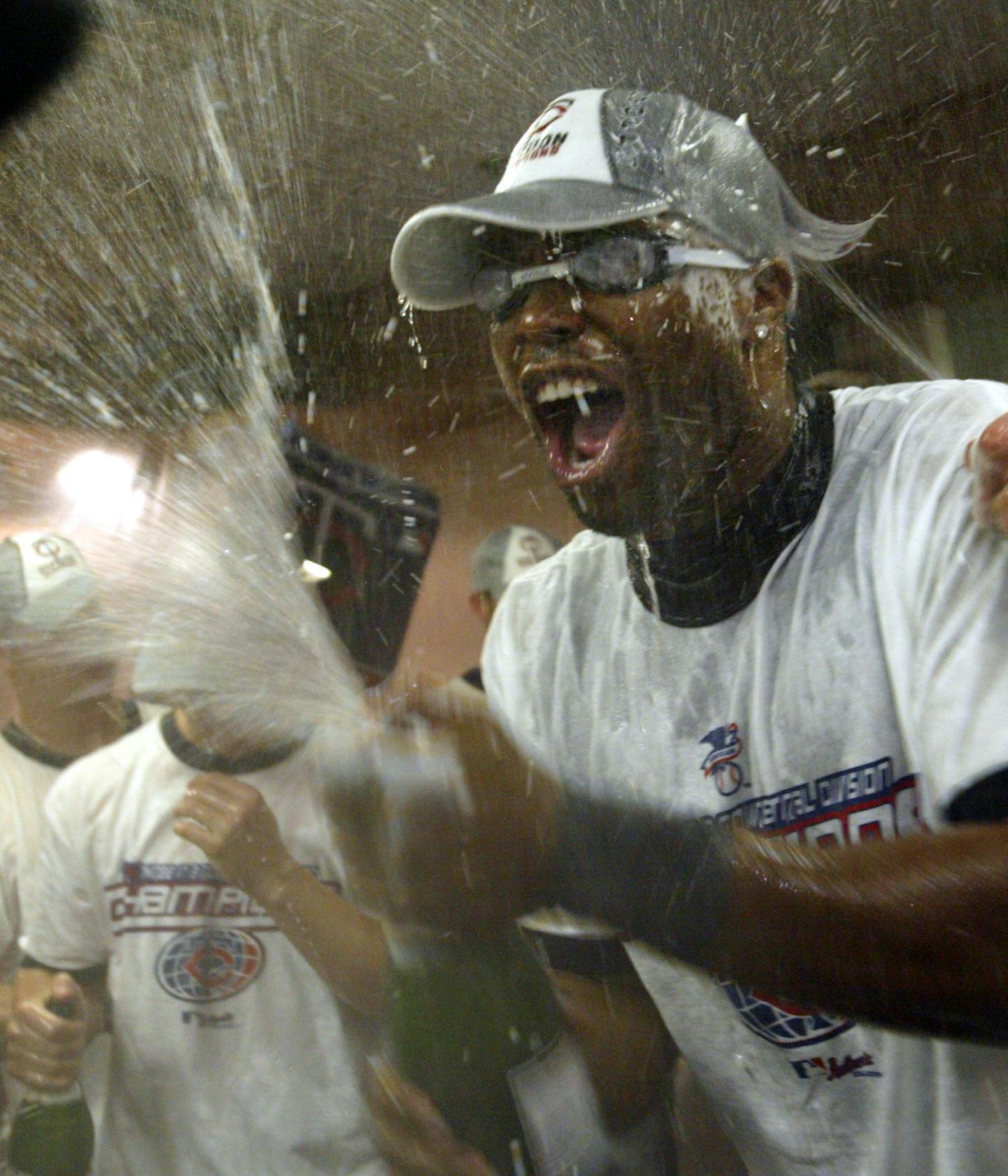 9/20/04- Minnesota Twins vs. Chicago White Sox in Chicago and U.S> Celuular Field. - Twins center fielder Tori Hunter, wearing goggles, was the Twins player best prepared for the spray of champagne in the clubhouse following the team's 8-2 victory over the White Sox, which clinched the division title.