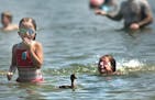 With temperatures in the 90s, even a duck decided to cool off in the waters of Lake Nokomis on a hot, August afternoon.