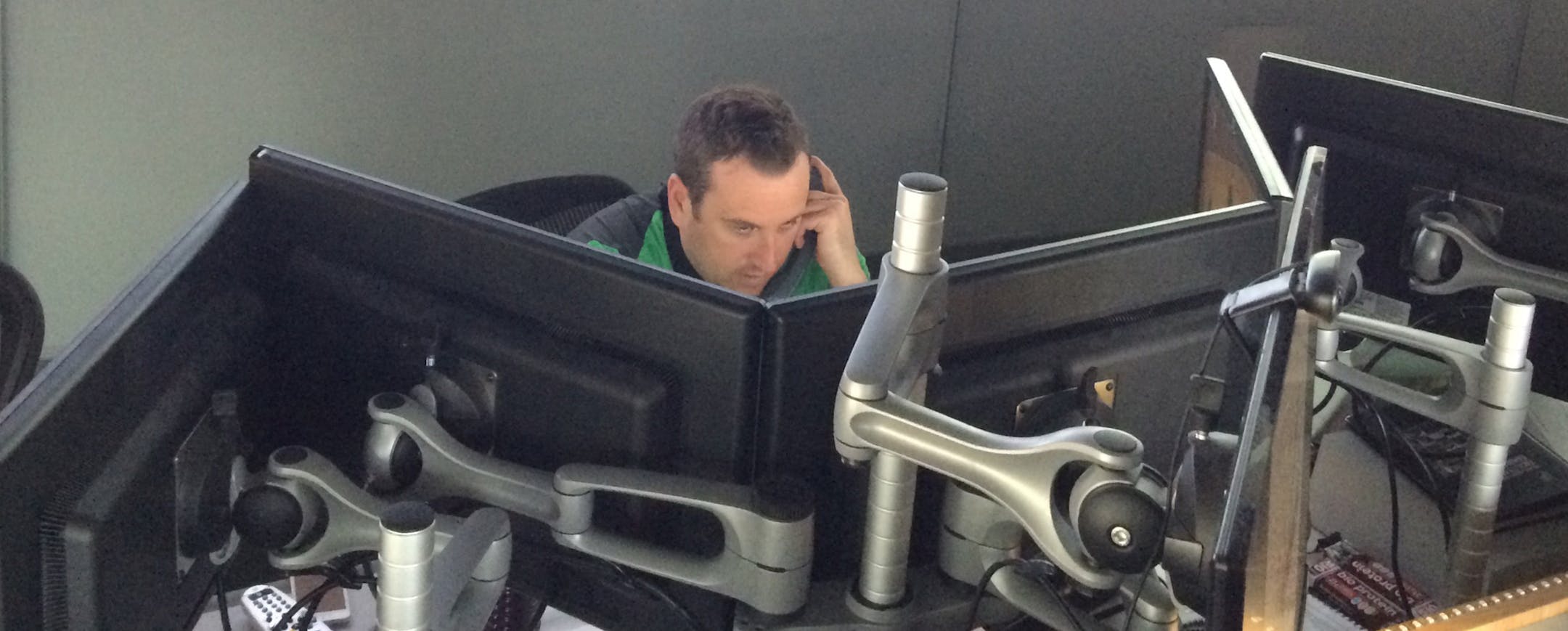 Coordinator Tim Campbell reviewing a goal in the NHL situation room in Toronto.