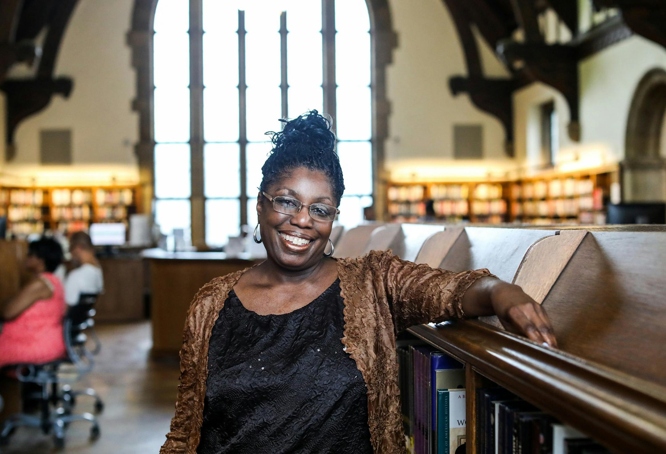 Disa Bryant, 51, of Detroit lost her home due to foreclosure for unpaid property taxes and found herself homeless in 2016, but thanks to the quick thinking of a librarian at her nieghborood library, Parkman Branch, she was able to apply for a grant that would help her find a new place to stay. Bryant is photographed at the library on Wednesday, June 20, 2018. (Kimberly P. Mitchell/Detroit Free Press/TNS)