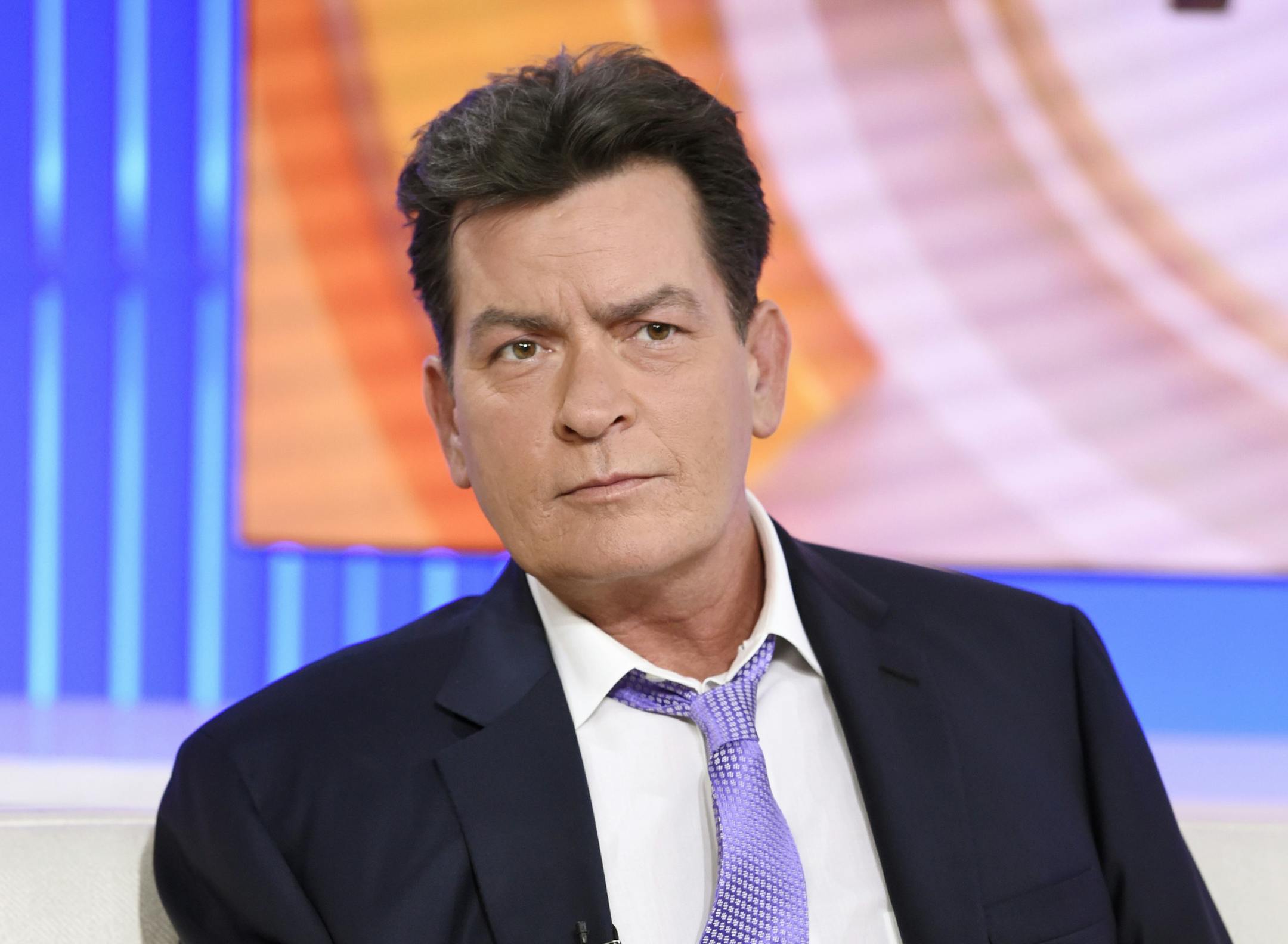 Actor Charlie Sheen appears during an interview, Tuesday, Nov. 17, 2015 on NBC's "Today" in New York. In the interview, the 50-year-old Sheen said he tested positive four years ago for the virus that causes AIDS. (Peter Kramer/NBC via AP)