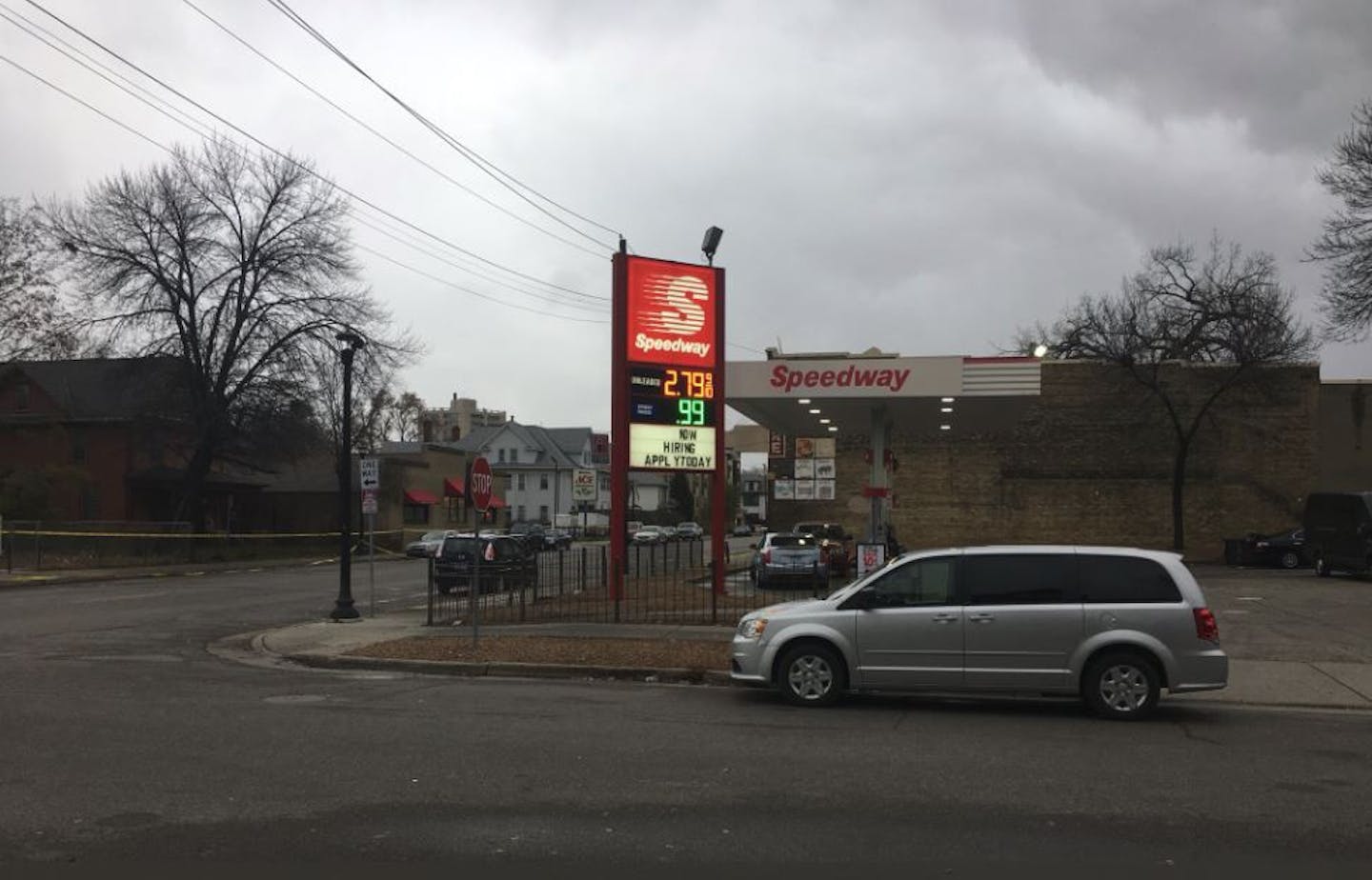 A crime lab technician worked at the scene where a man was shot Tuesday and later died outside a Minneapolis Speedway gas station. (Photo by Libor Jany)