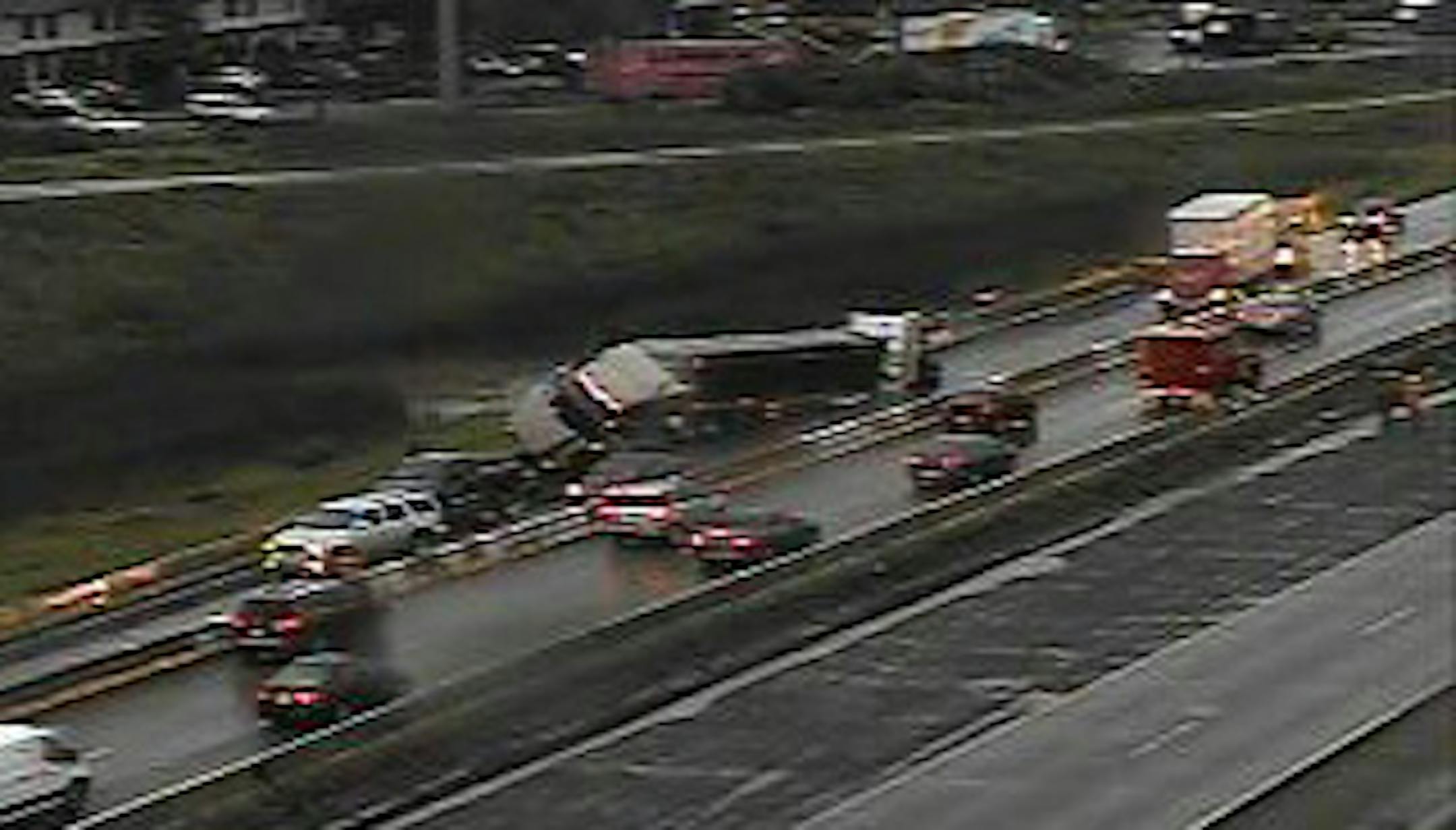 A semi sput out on northbound Interstate 494 near Hwy. 55 Monday morning during a wet morning commute.