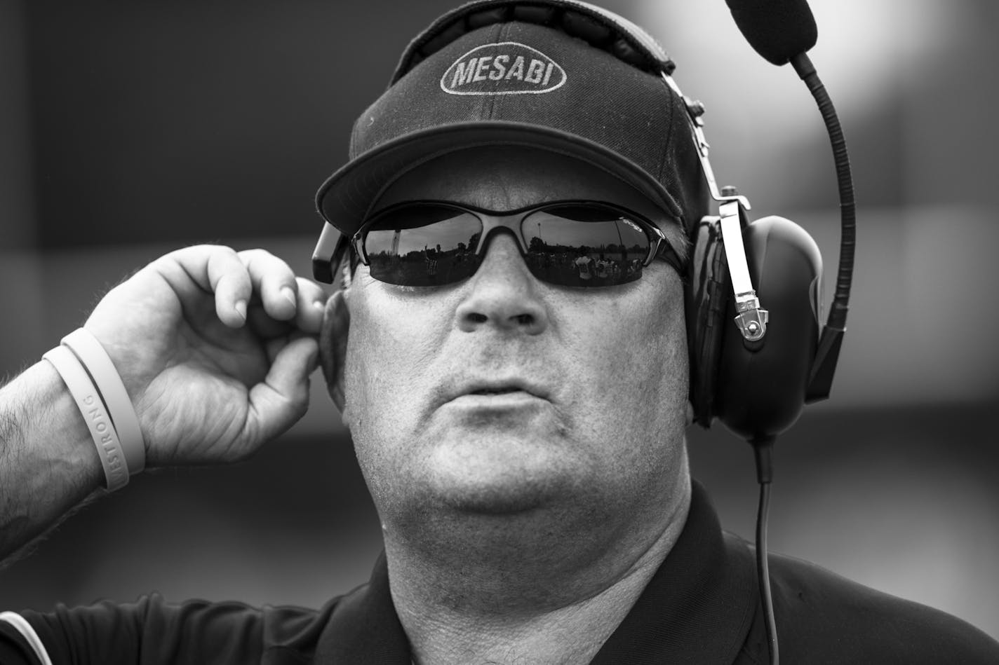 Mesabi Range head coach Dan Lind watched over the team during their season opener against Ridgewater in Willmar in late August. Photos to accompany a story on the Mesabi Range College Football team in Virginia, Minnesota. The team, which consists mostly of black athletes recruited from around the country, struggles to find its place in mostly-white mining country on the Iron Range.