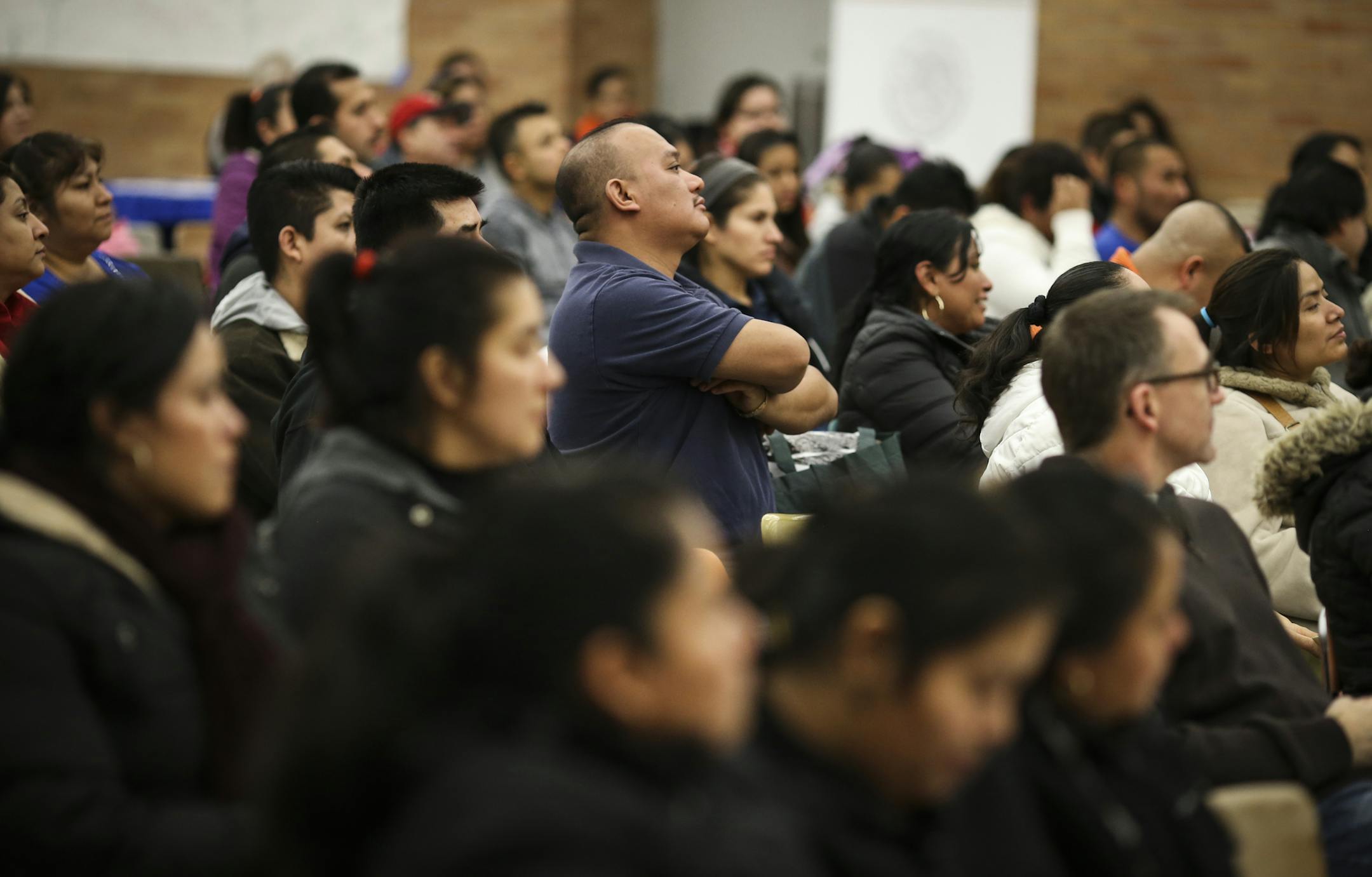 Close to 200 people attended at an informational meeting on applying for work permits and deportation relief under Obama's executive order at Richfield High School in Richfield, Minn. on Thursday, December 18, 2014. ] RENÉE JONES SCHNEIDER reneejones@startribune.com