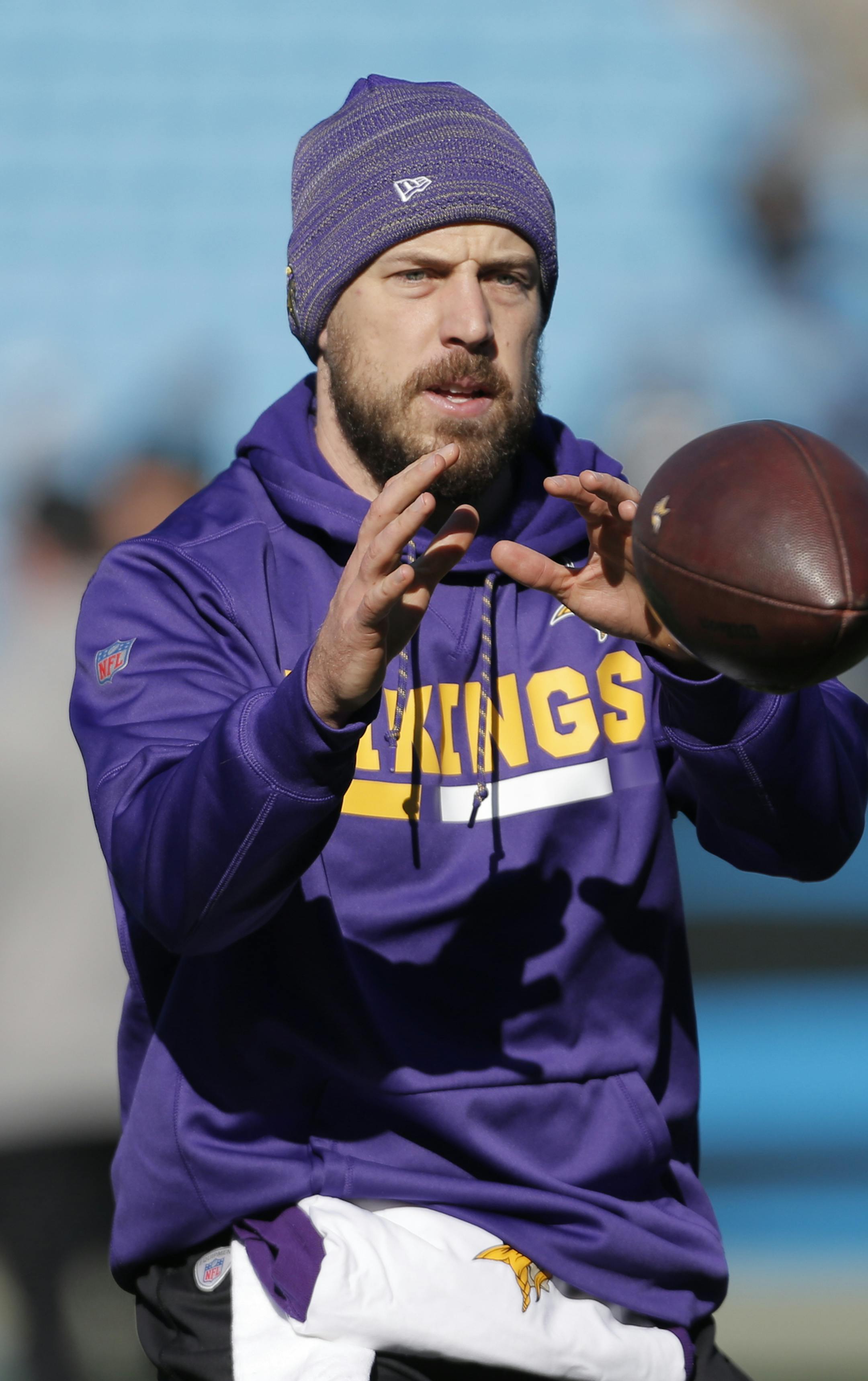 Minnesota Vikings' Case Keenum warms up before an NFL football game against the Carolina Panthers in Charlotte, N.C., Sunday, Dec. 10, 2017. (AP Photo/Bob Leverone)