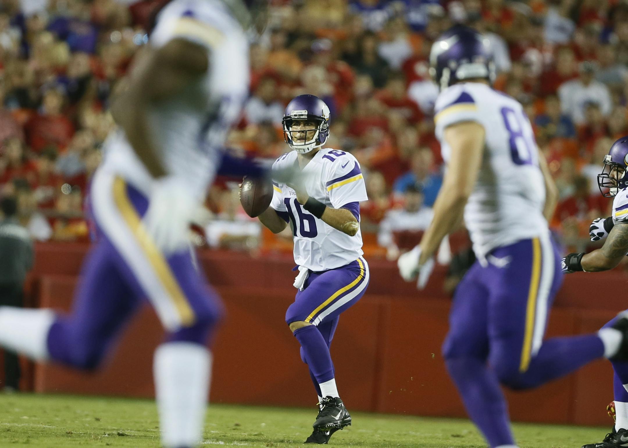 Minnesota Vikings quarterback Matt Cassel (16) looked down field during preseason NFL football between the Minnesota Vikings and Kansas City Chiefs Saturday August 23 , 2014 in Kansas City ,MO .