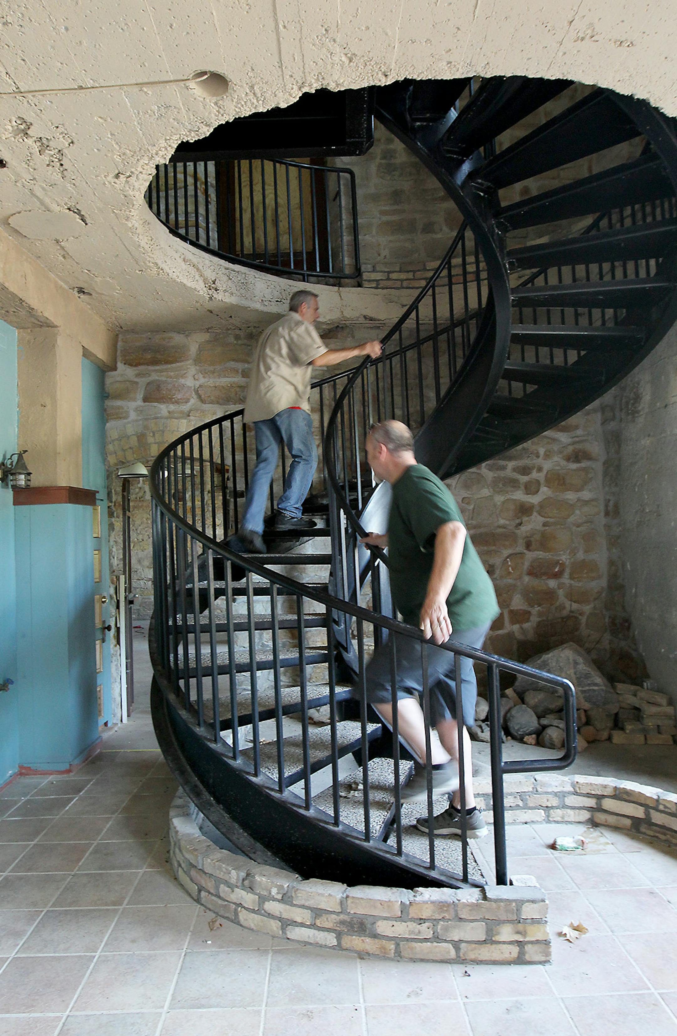 Kevin Breeggemann, left, and Tim Roets inspected the evacuated and condemned Jordan Brewery building, Friday, June 26, 2015 in Jordan, MN. ] (ELIZABETH FLORES/STAR TRIBUNE) ELIZABETH FLORES &#x2022; eflores@startribune.com