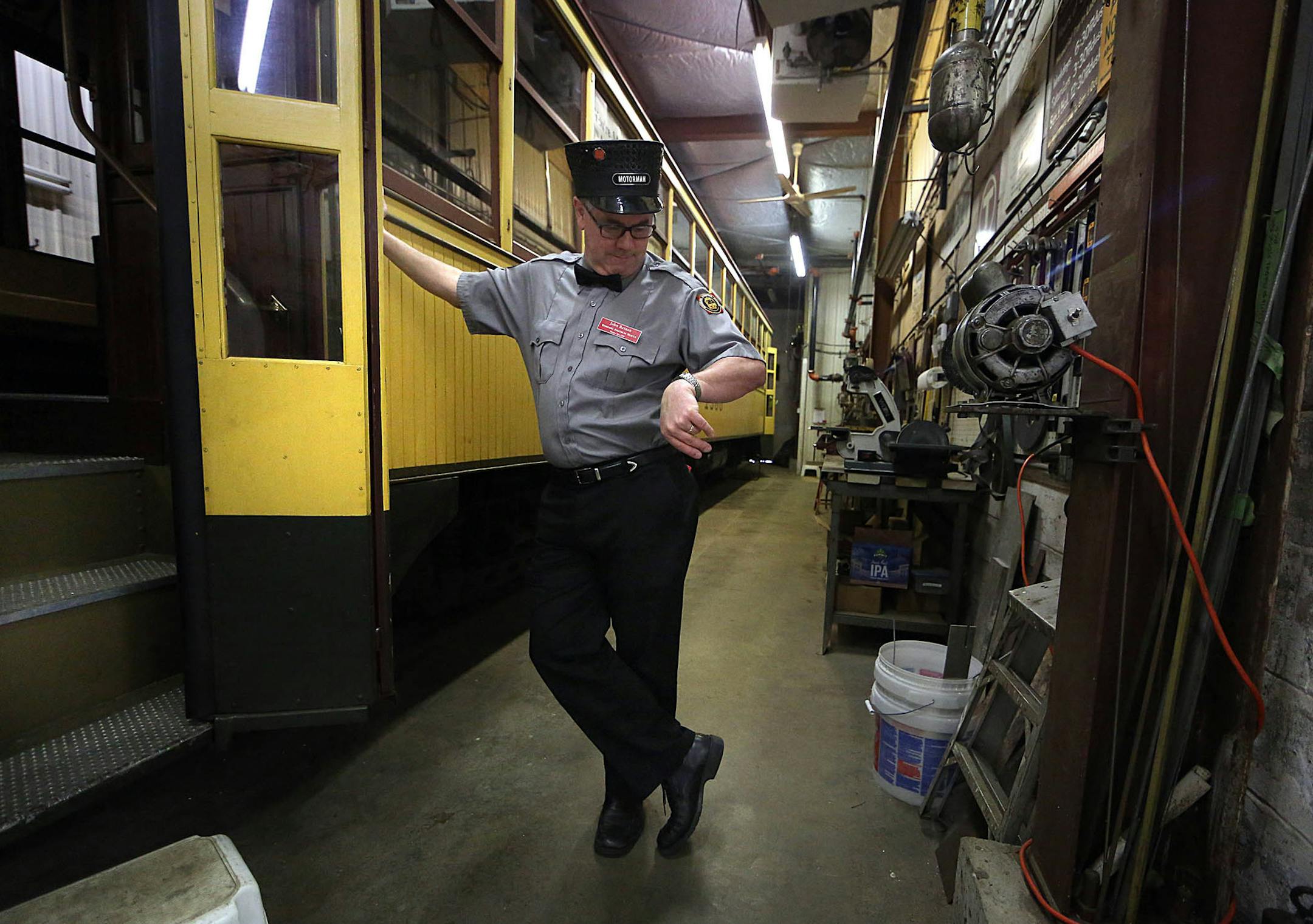 Volunteer John Reinan checked his watch at the start of a day at the trolley storage and maintenance barn.