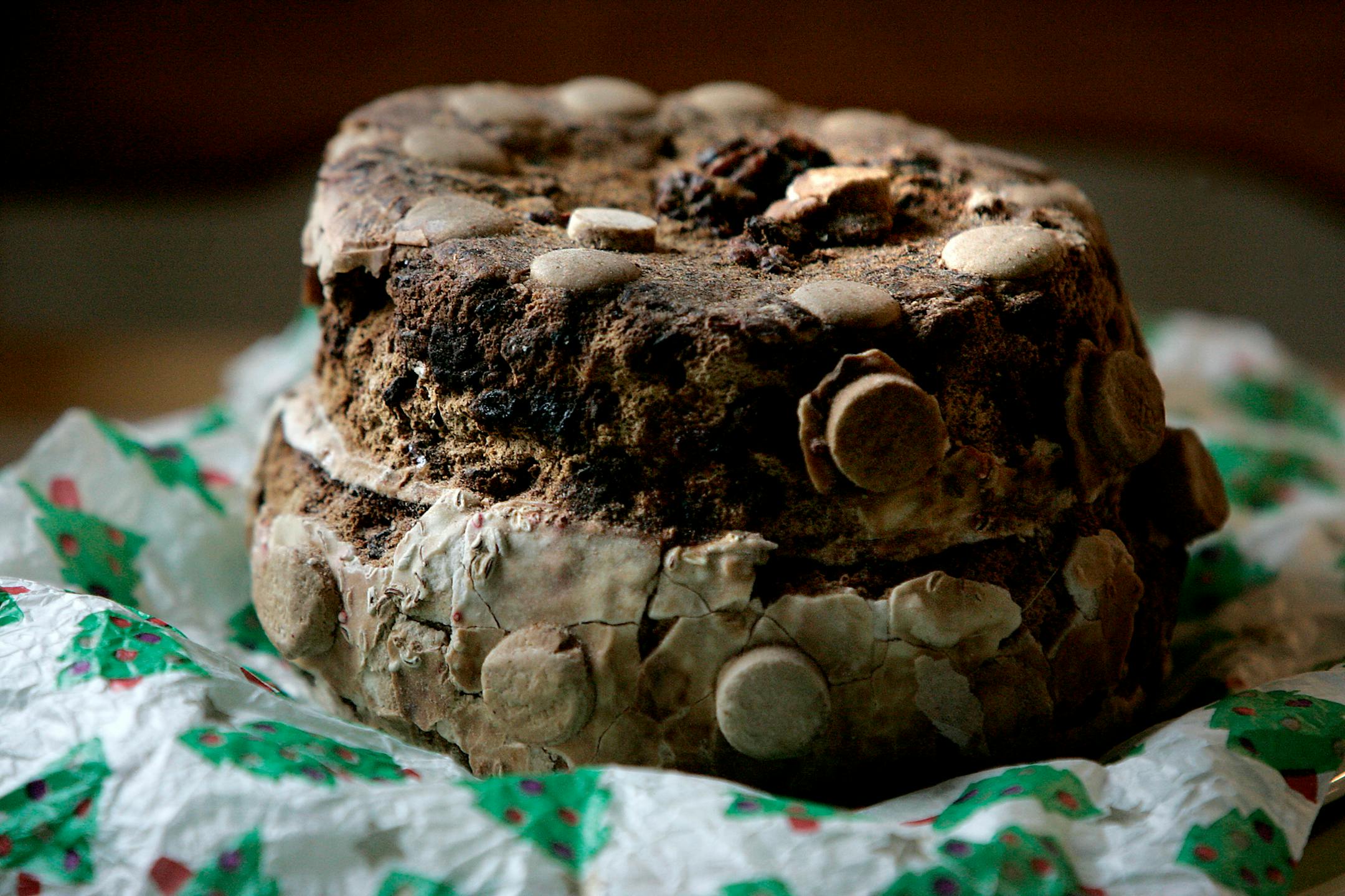 A fruitcake circa1911 is the centerpiece at most of Pierre Girard's holiday gatherings.