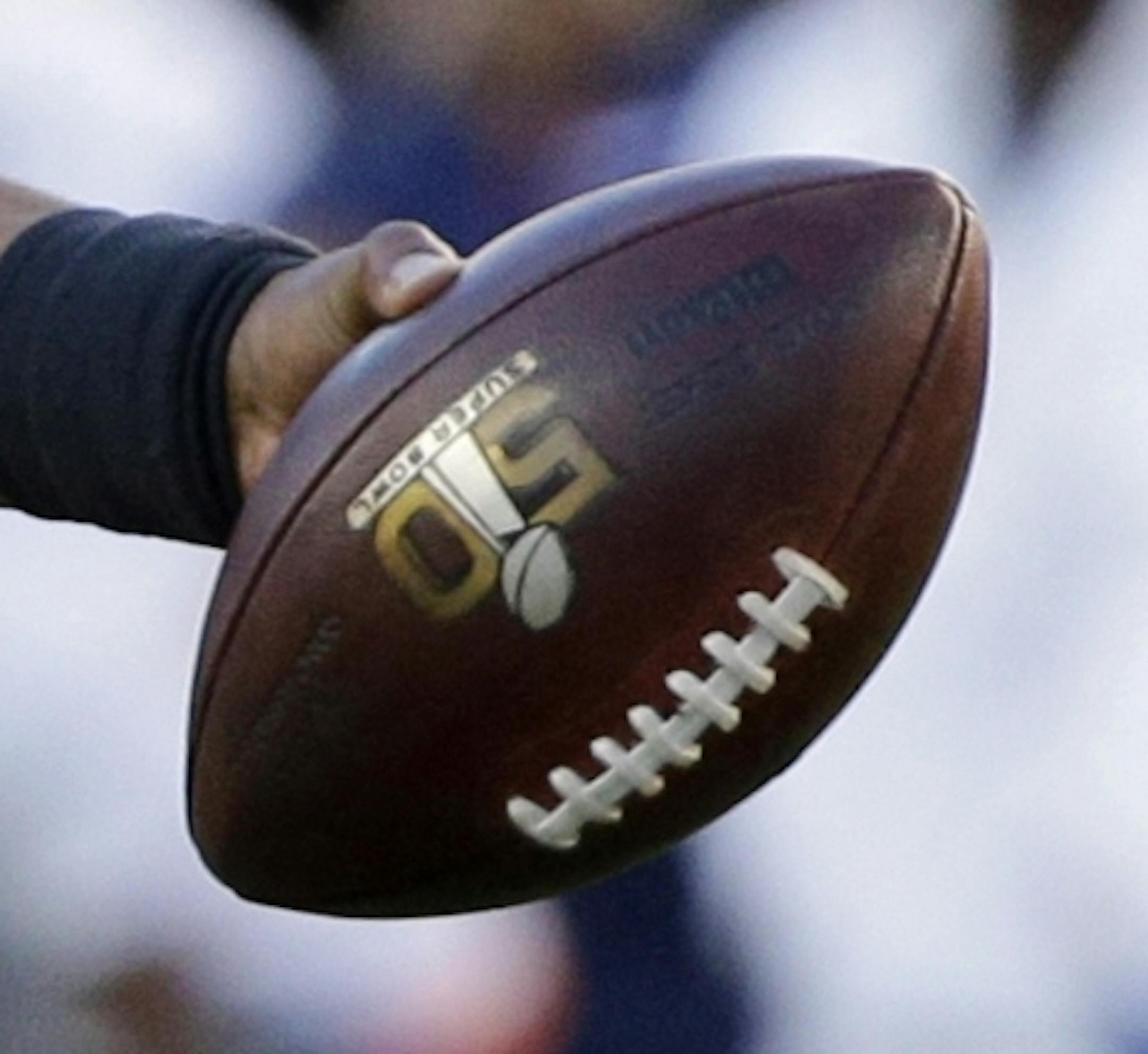 Carolina Panthersí Cam Newton (1) hands off the ball during the first half of the NFL Super Bowl 50 football game Sunday, Feb. 7, 2016, in Santa Clara, Calif. (AP Photo/Julie Jacobson)
